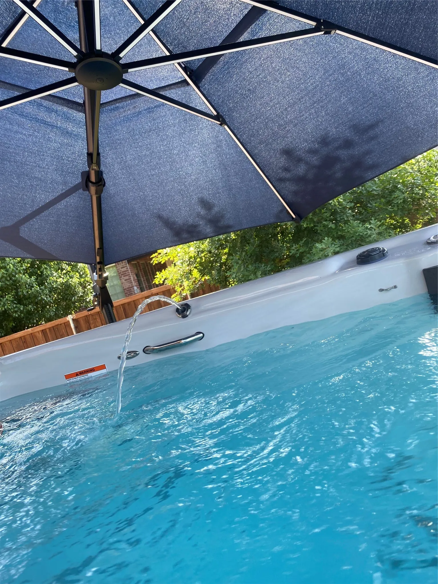 Aquatic exercise section of the dual-zone swim spa, ideal for swimming, fitness, therapy, and recreation.