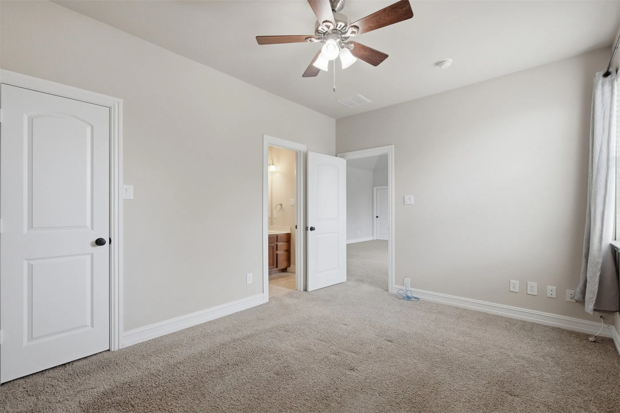 Private upstairs bedroom creates a flexible retreat for guests, teenagers, or multigenerational living.
