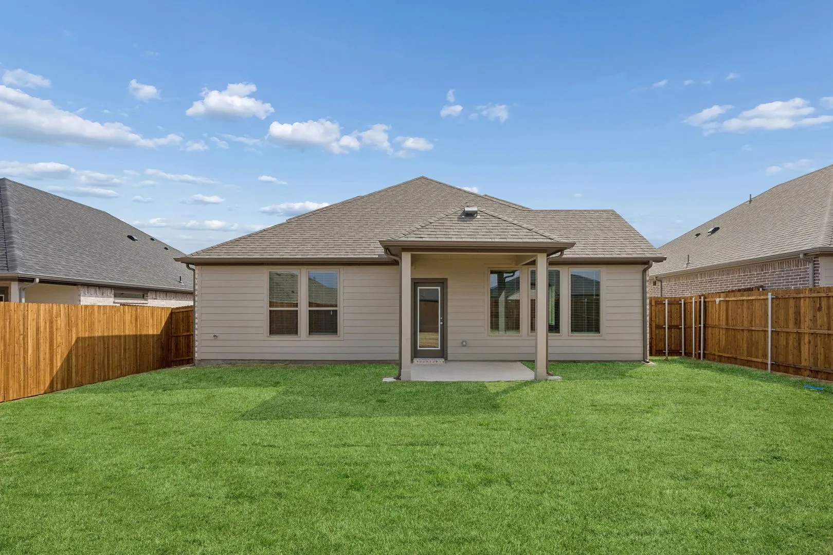 Covered Patio in the Stanley II home plan by Trophy Signature Homes – REPRESENTATIVE PHOTO