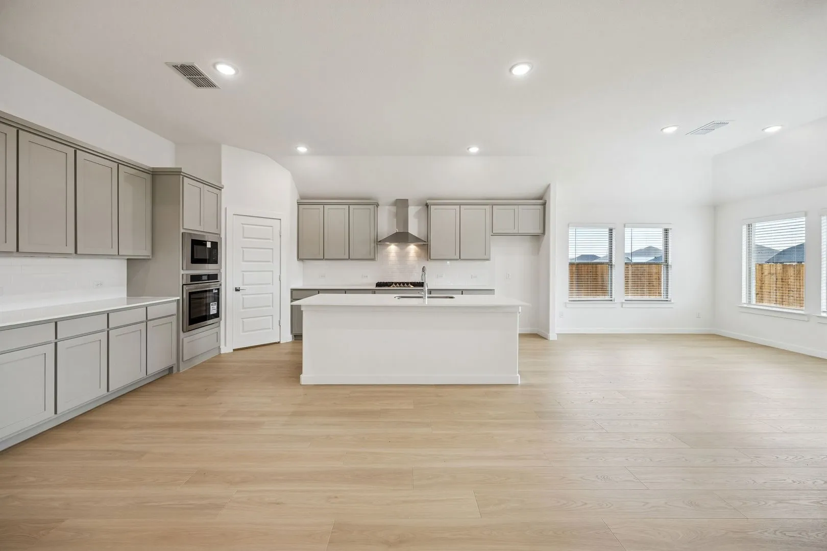 Kitchen in the Gilmour II home plan by Trophy Signature Homes – REPRESENTATIVE PHOTO