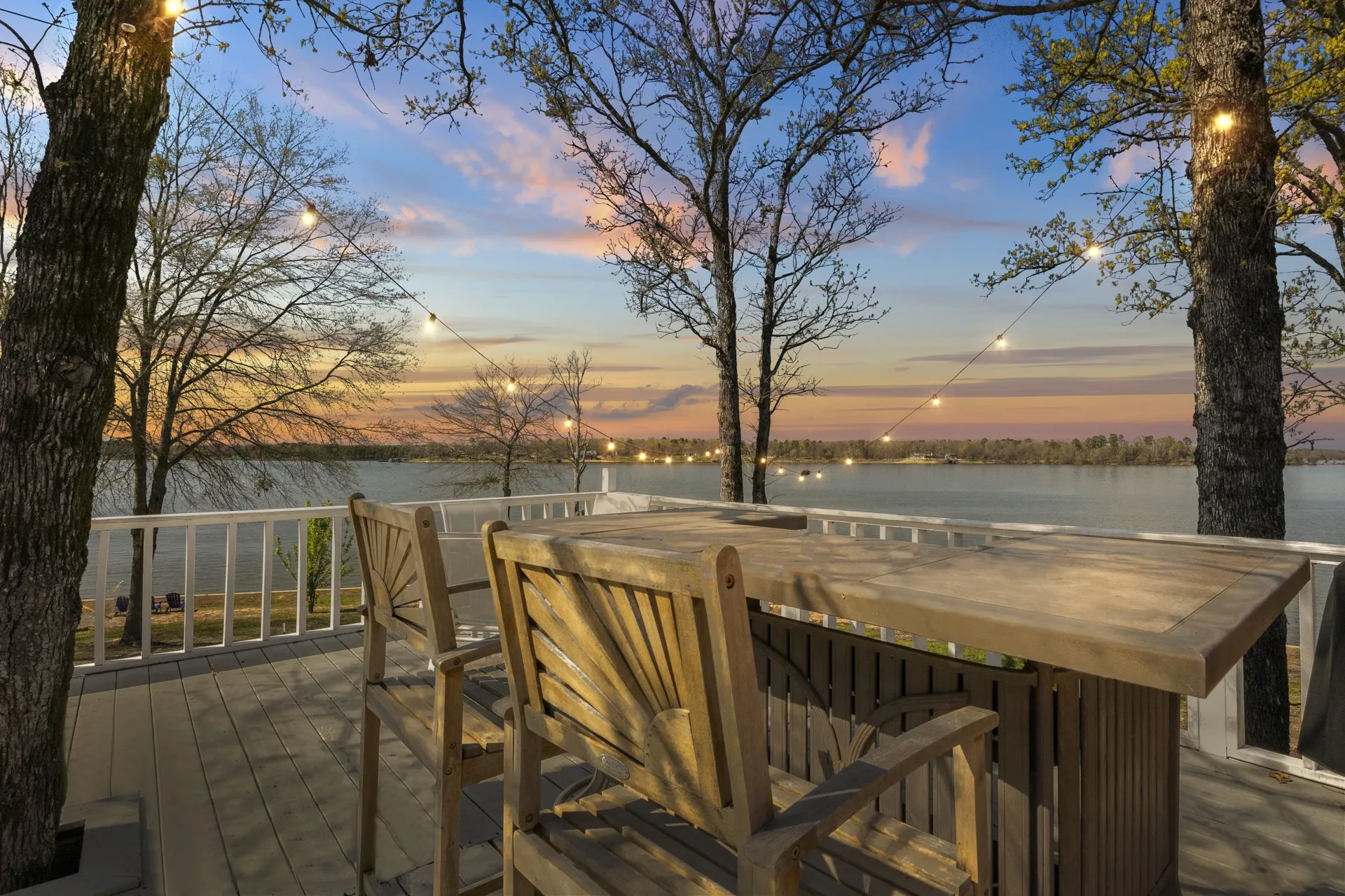 Deck at dusk with a water view