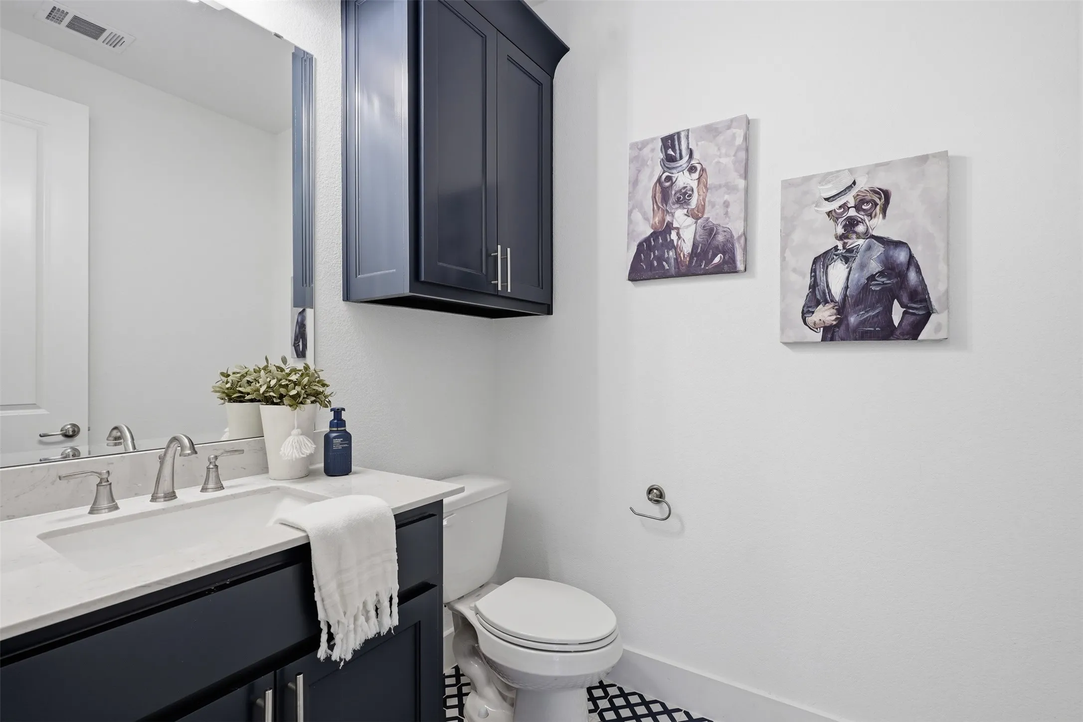 Hall Half bath with easy access to back patio