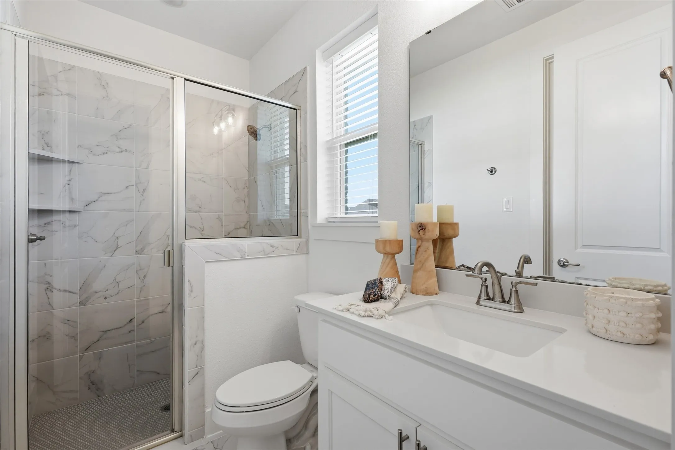 Private full bathroom attached to non-primary bedroom