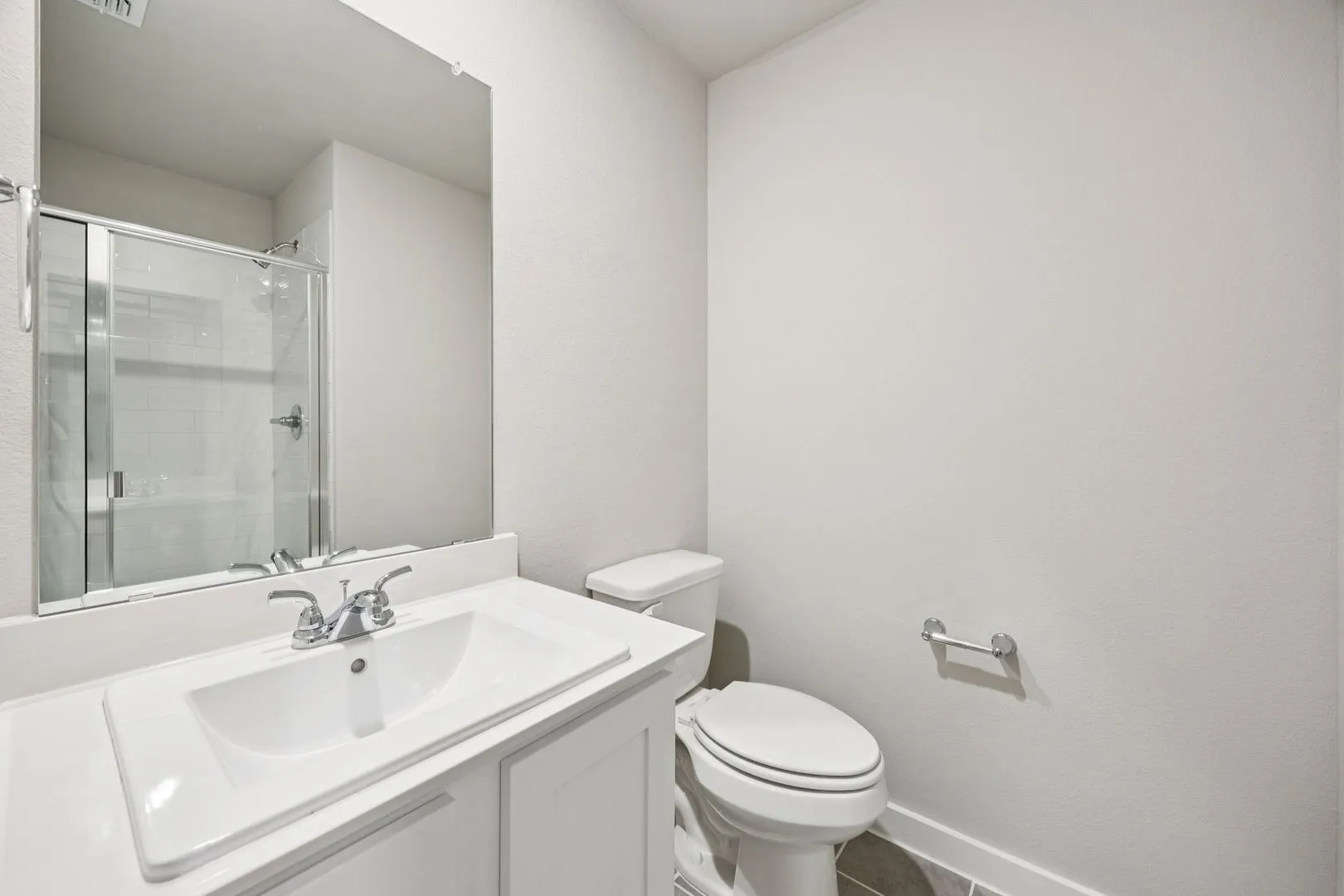Bathroom in the Hayden home plan by Trophy Signature Homes – REPRESENTATIVE PHOTO