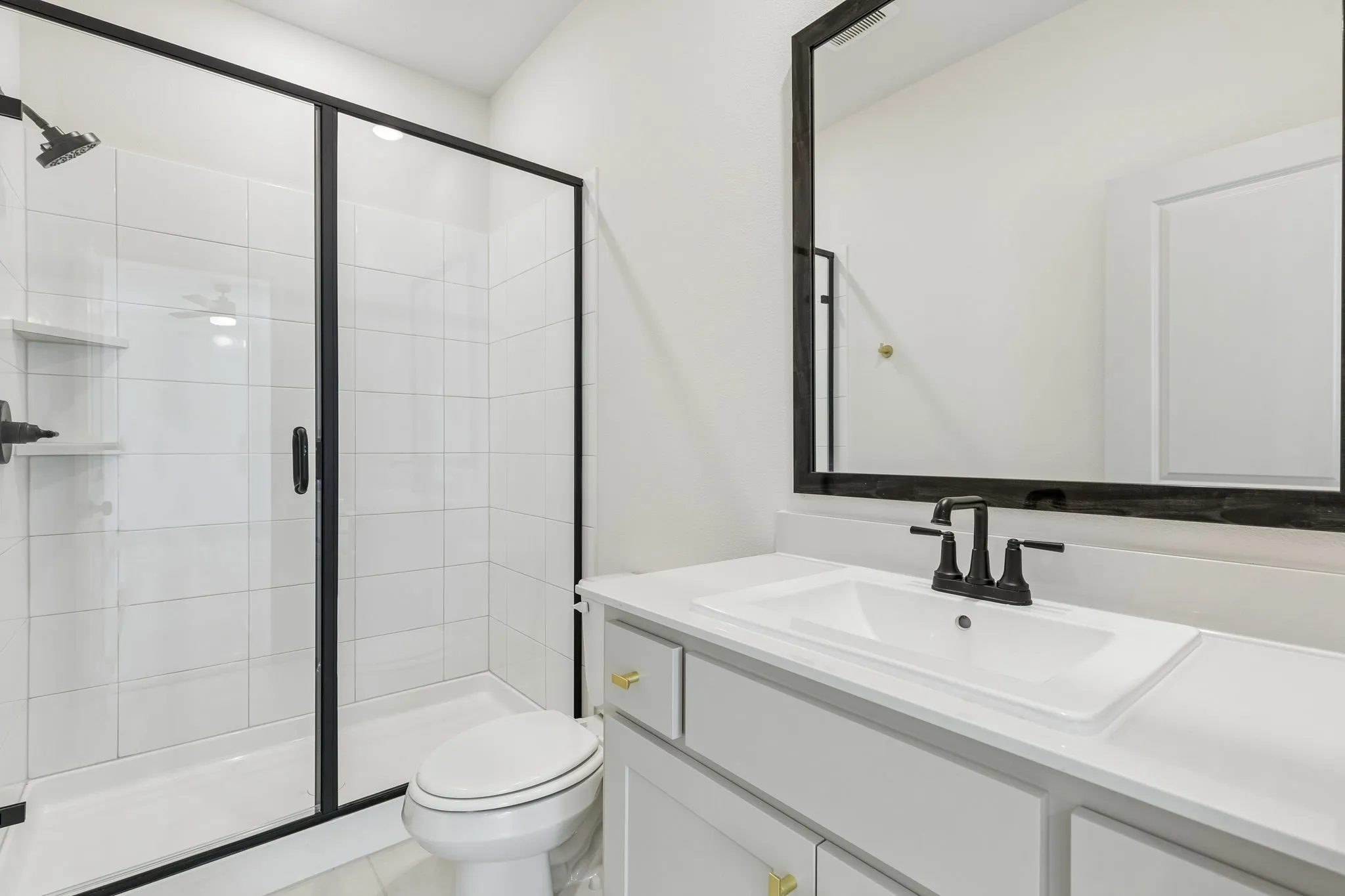 Guests will feel right at home in either of the beautifully finished guest baths in our our Remy floor plan.