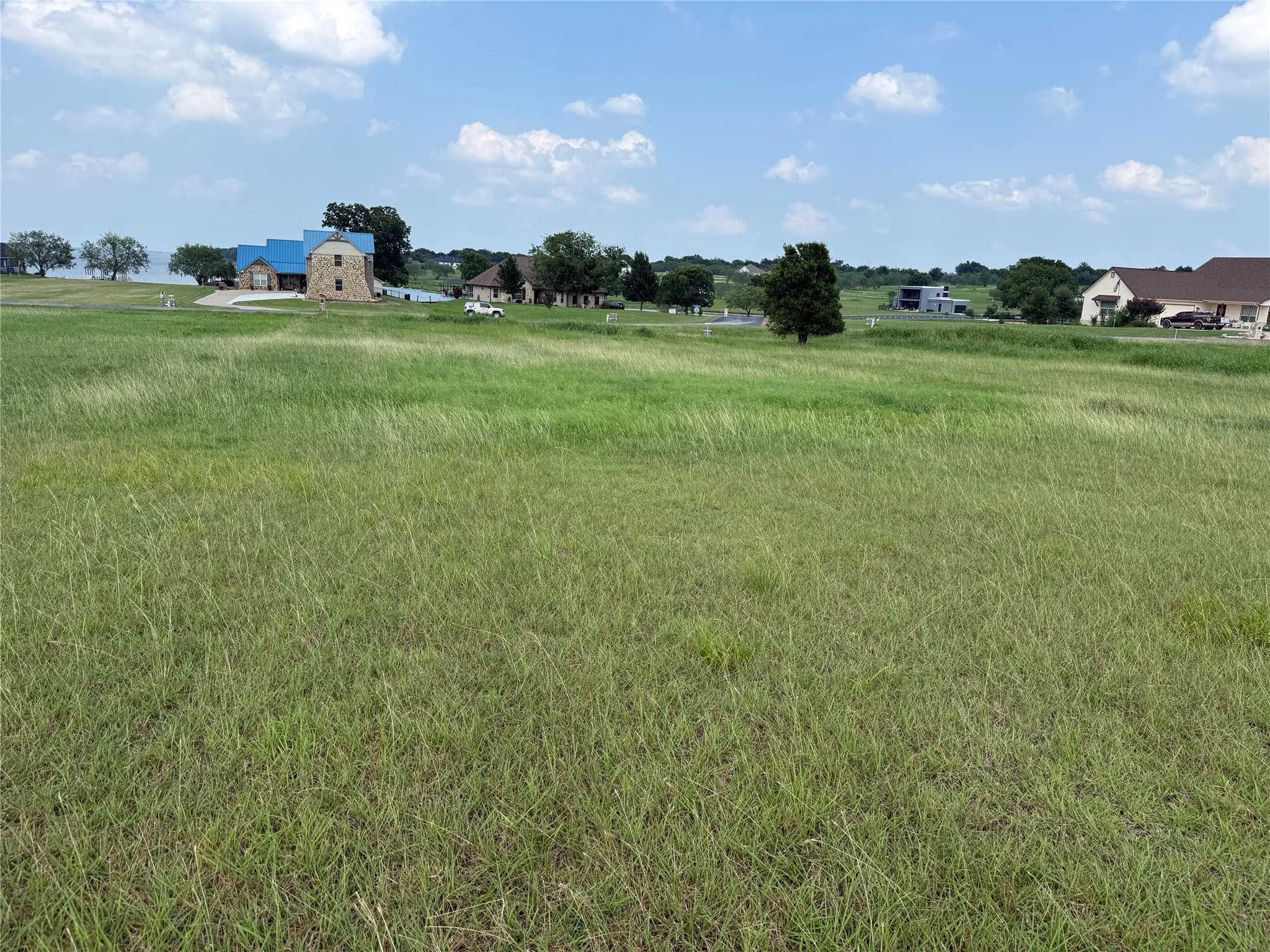 Large homesite offering room for outdoor entertaining and recreation.