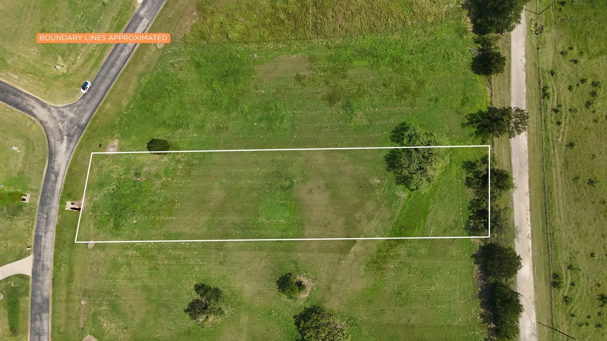 Boundary aerial showing lot dimensions and private road access.