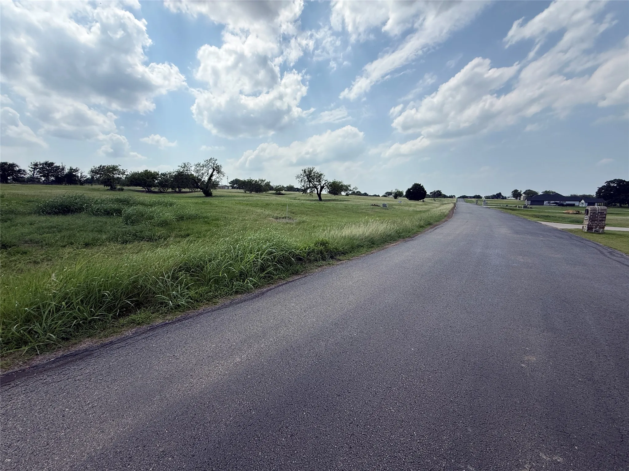 Well-maintained private road winds through the neighborhood.