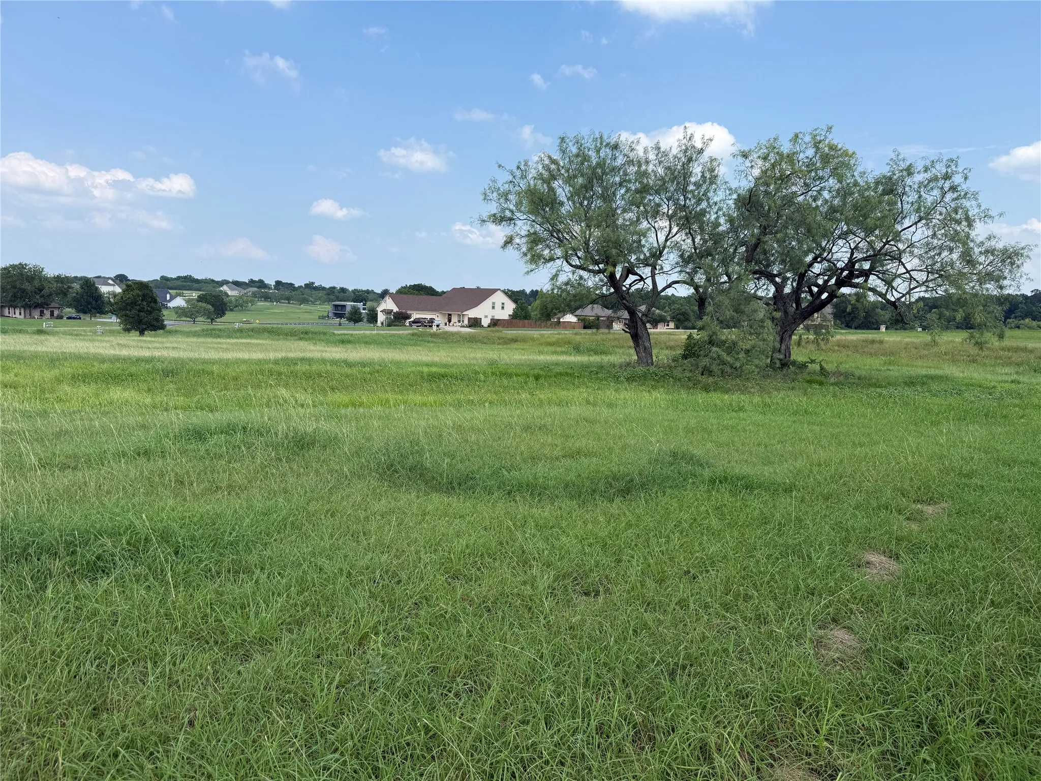 View toward nearby luxury homes within Southpoint on Richland Chambers Lake.