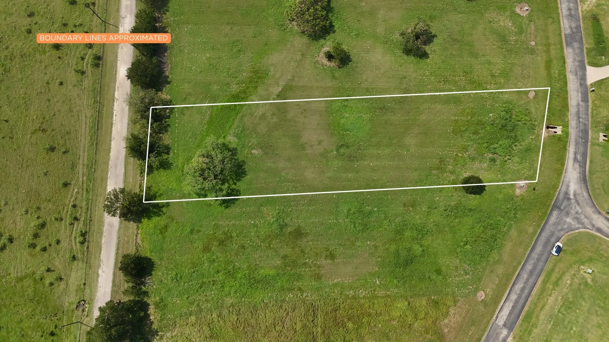 Boundary aerial showing lot dimensions and private road access.