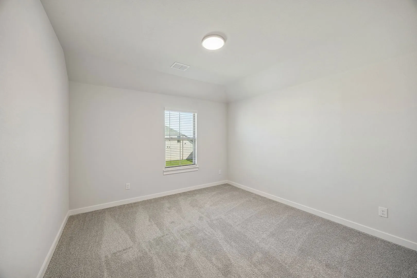 Bedroom in the Wimbledon home plan by Trophy Signature Homes – REPRESENTATIVE PHOTO