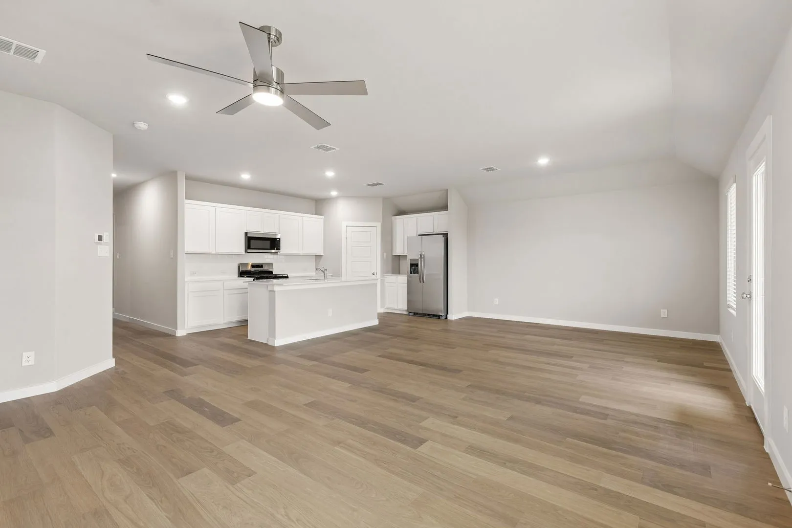 Open Floor Plan in the Emmy II home plan by Trophy Signature Homes - REPRESENTATIVE PHOTO
