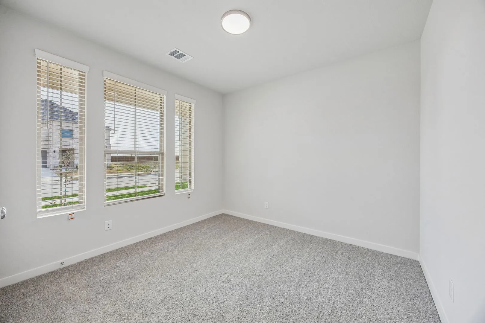 Bedroom in the Stanley II home plan by Trophy Signature Homes – REPRESENTATIVE PHOTO
