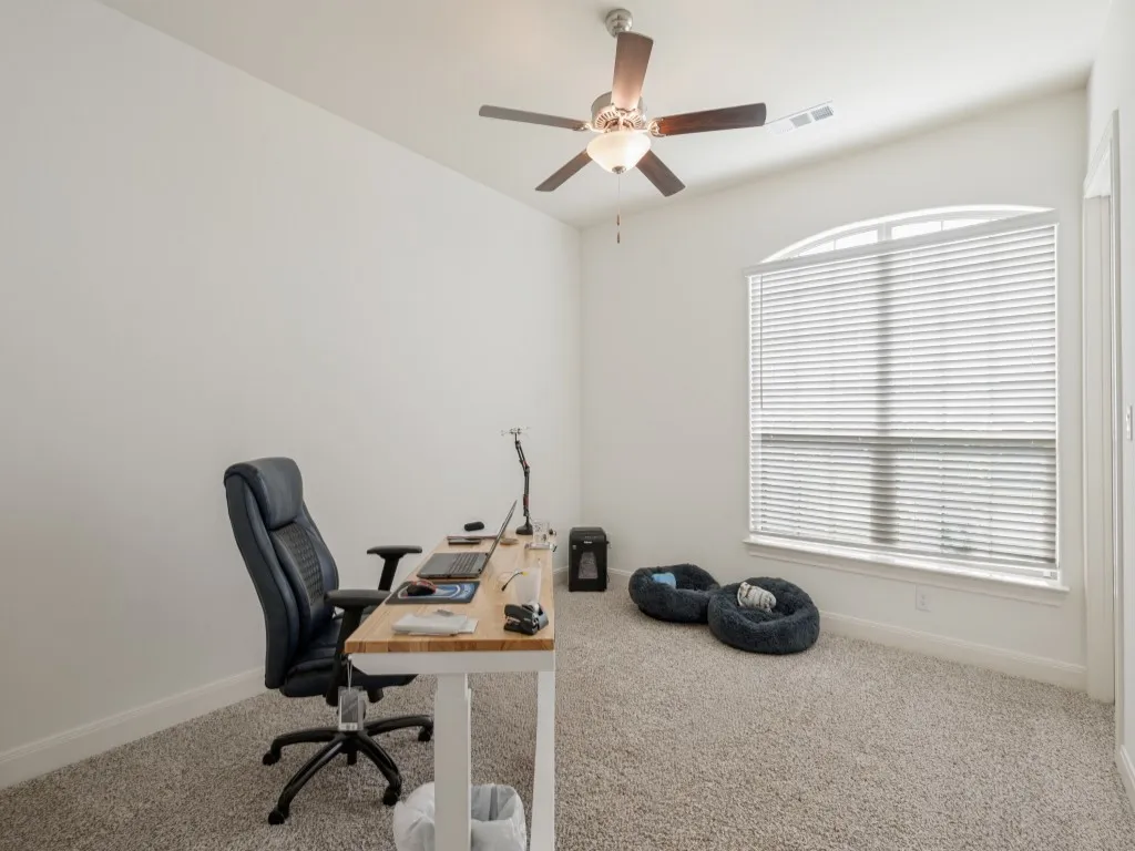 The bedrooms feature a large walk-in closet, large windows, ceiling fans and plush carpet.
