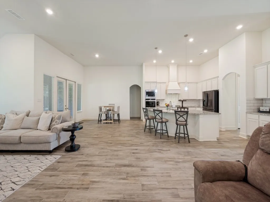 Beautiful light, bright kitchen.  Huge island with spacious breakfast bar. Double ovens, built-in microwave. Spacious breakfast nook offers plenty of room for casual dining.