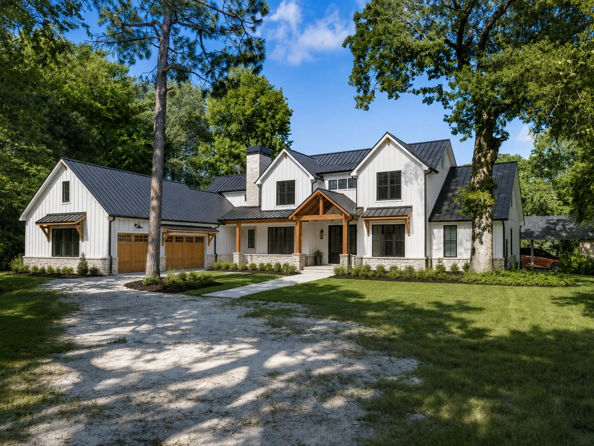 Virtual rendering of farmhouse exterior with white vertical siding and black metal roofing