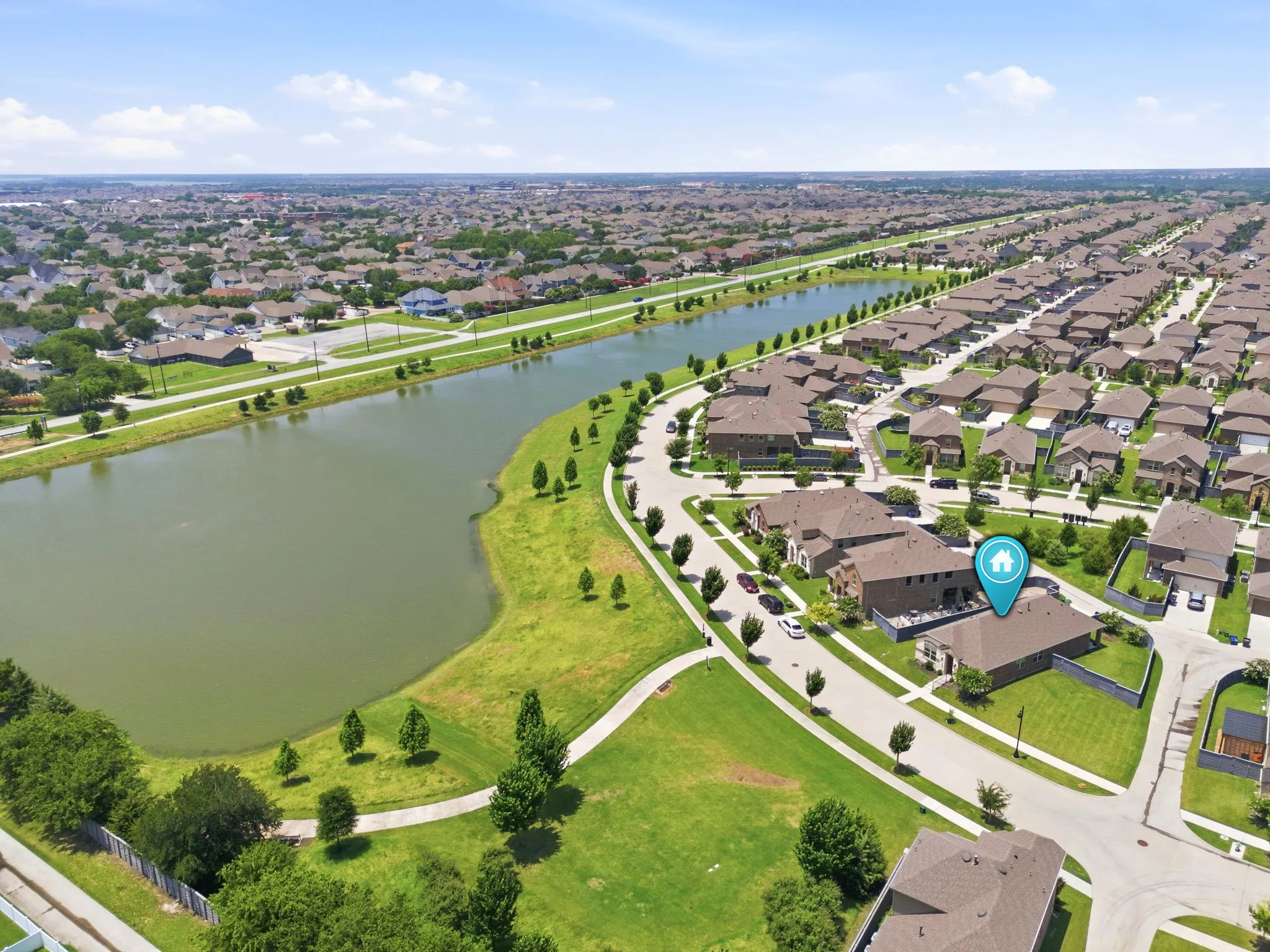 Aerial perspective highlighting a lakefront setting