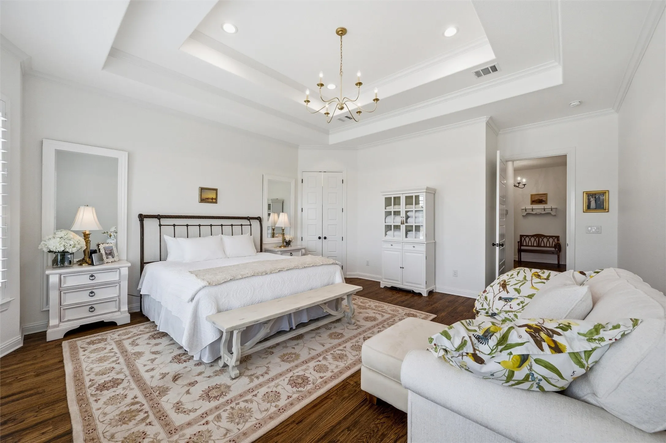 Primary bedroom with tray ceiling
