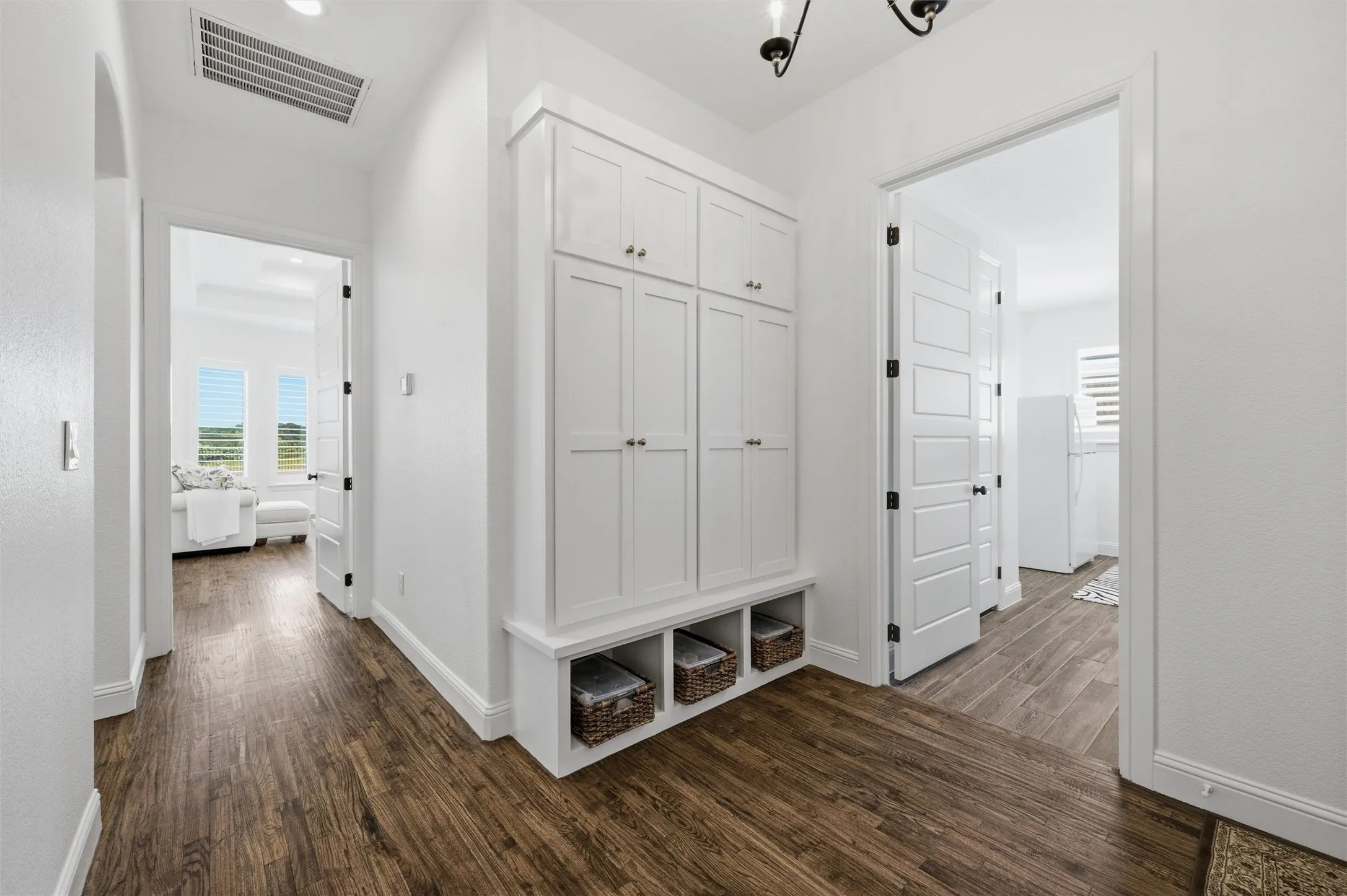 Mud room off of garage and laundry room