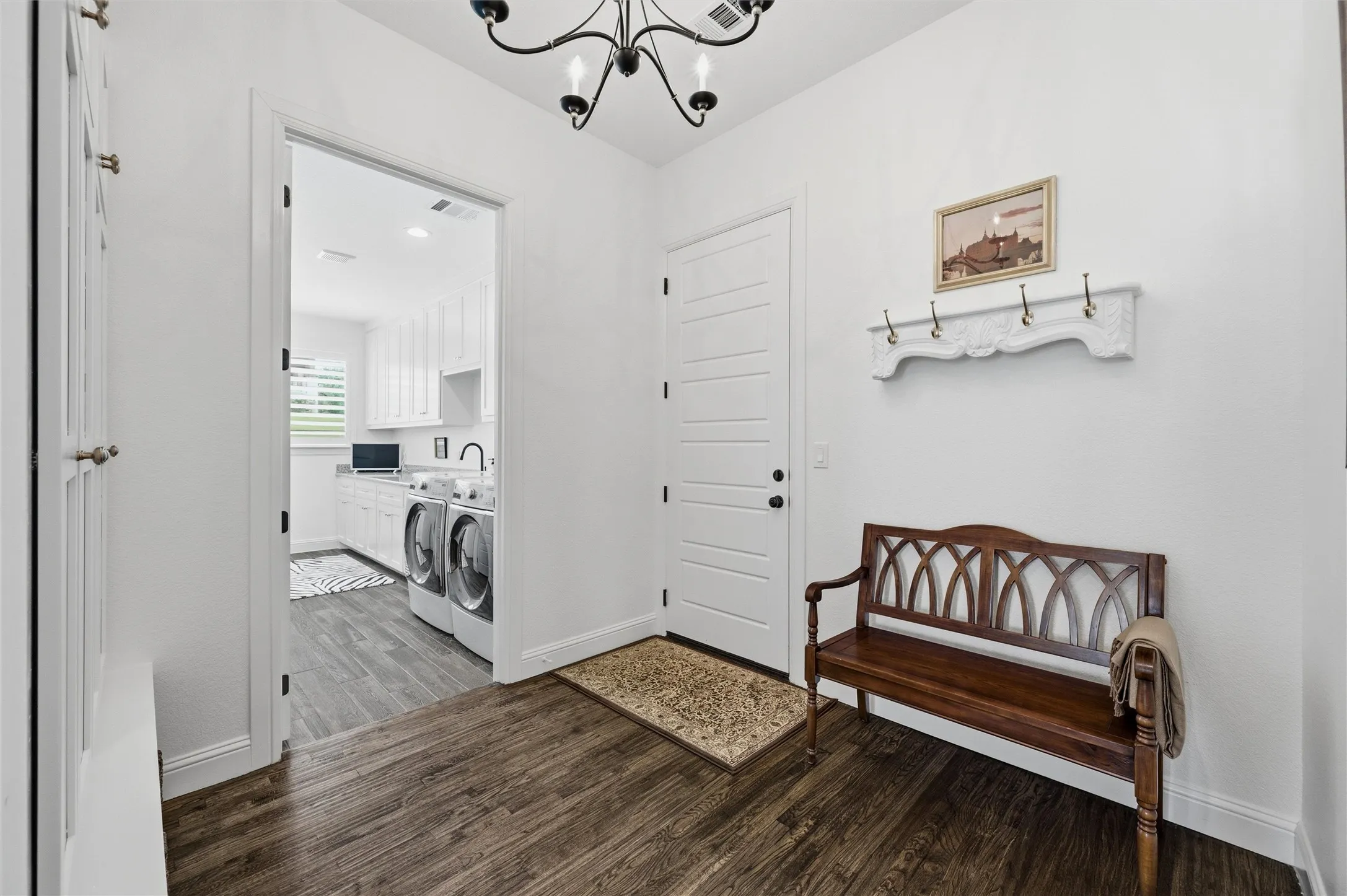 Mud room off of garage and laundry room