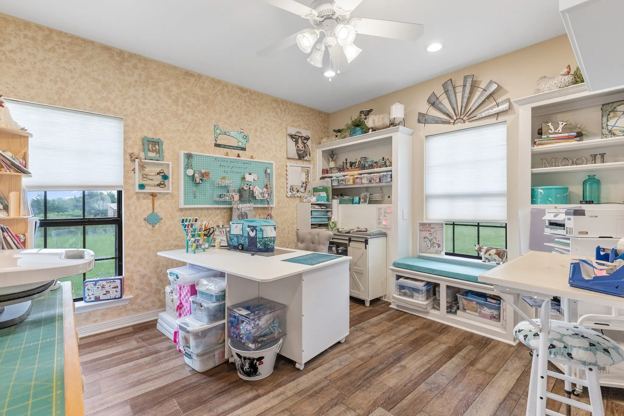 Spacious bedroom with built in twin bed headboards. Space is currently used as a hobby room.