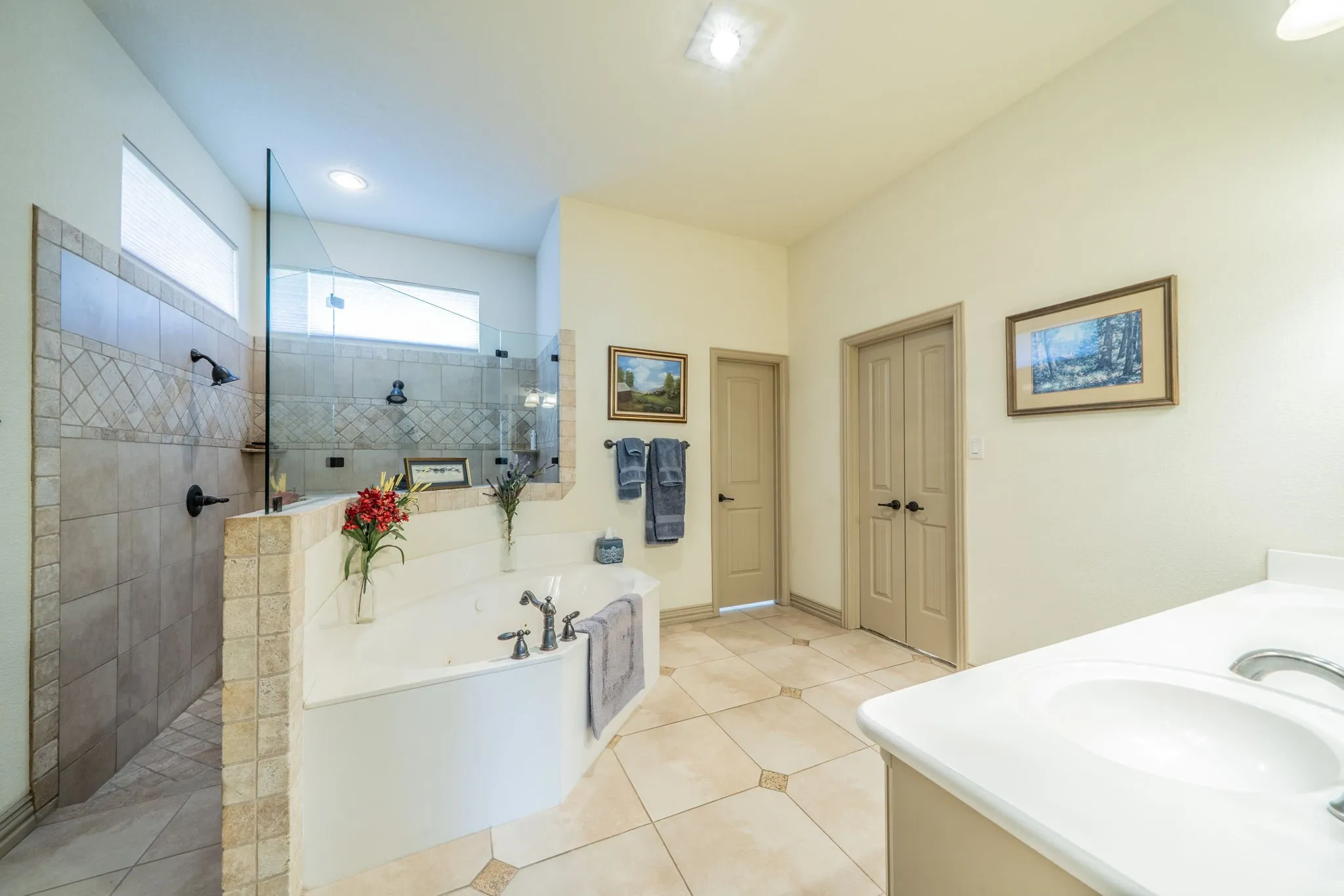 walk-in shower with two shower sprays.