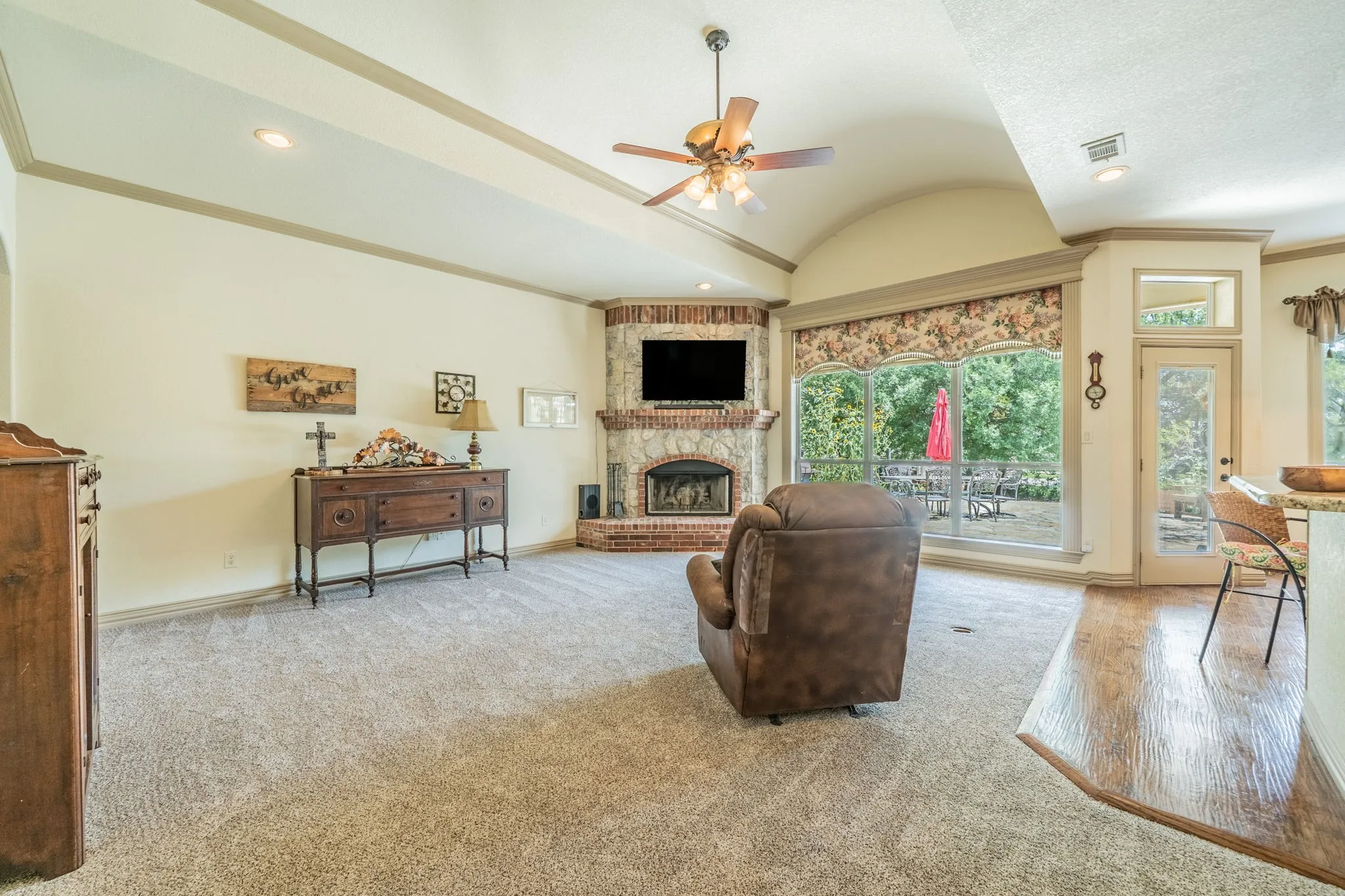 Stone and brick wood burning fireplace.