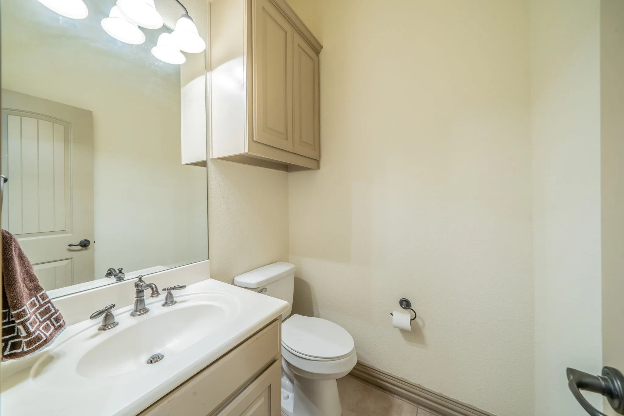 Half bath with storage.