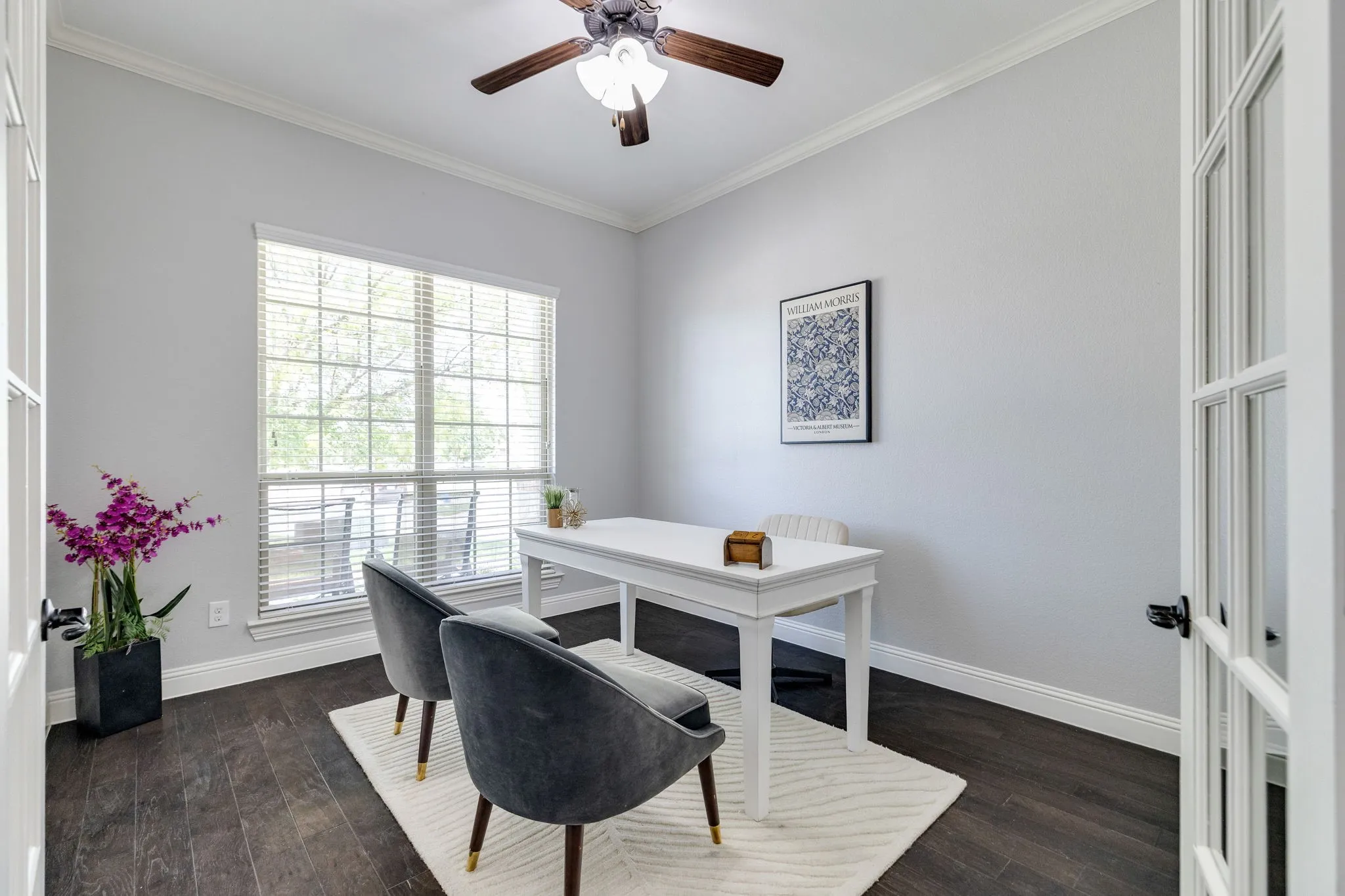 Room with French doors and dark wood-finish flooring