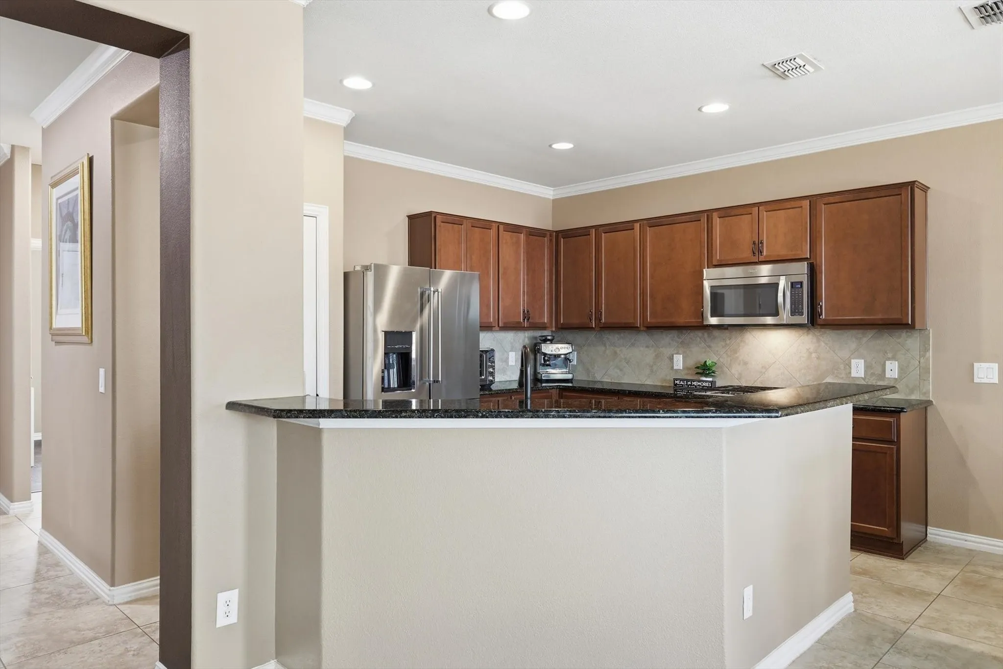 Functional kitchen with ample counter space and a seamless layout for everyday living.