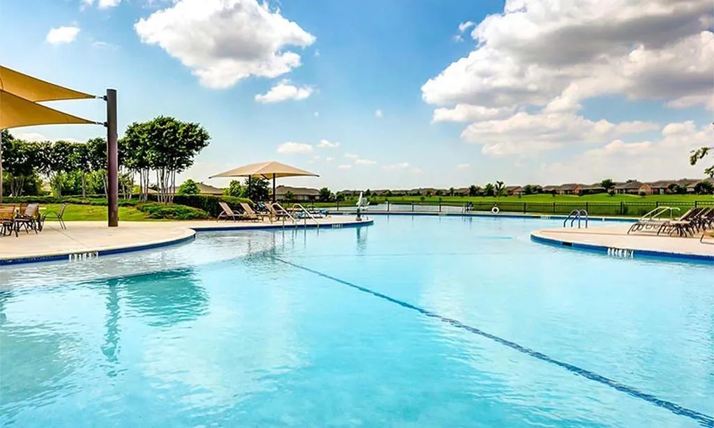 Enjoy this beautifully maintained resort-style community pool. Just one of 3 pools available. Perfect for relaxing or entertaining on sunny Texas days.