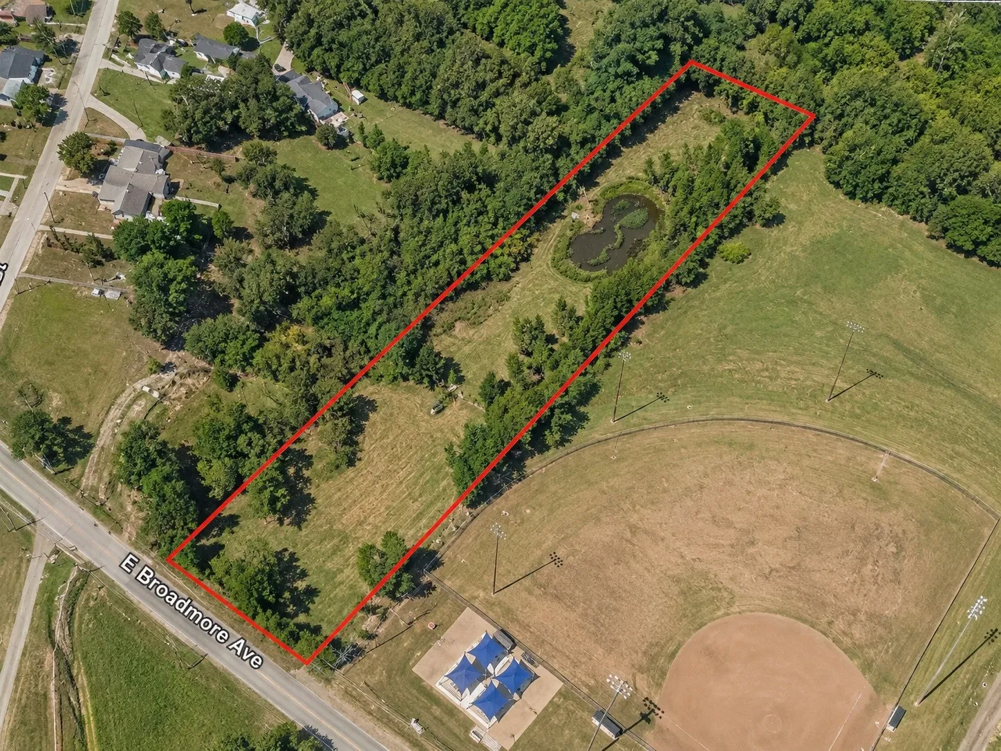 Aerial Property View. Displaying the boundaries of the property along E Broadmore Ave with surrounding features
