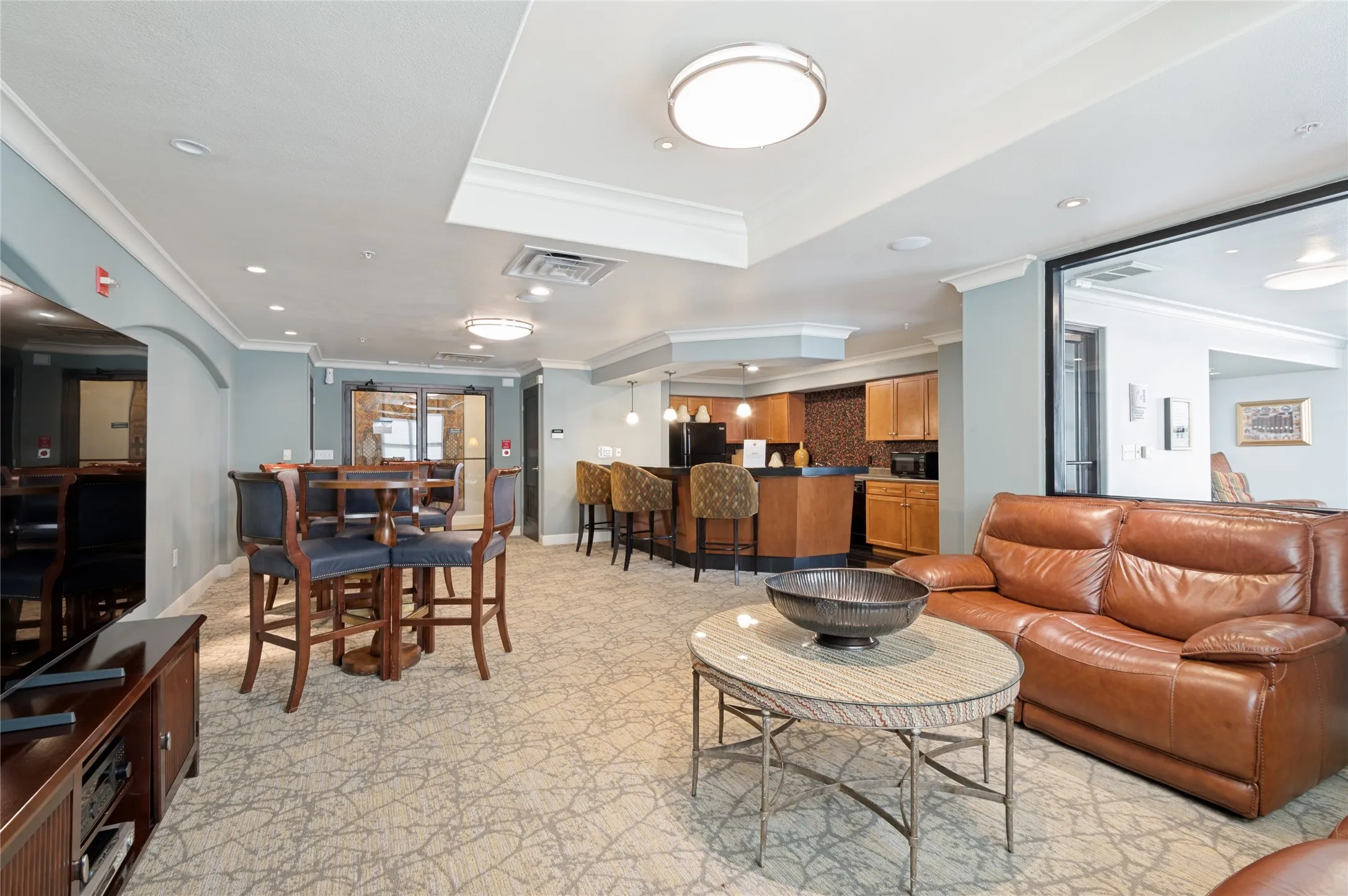Open-concept living area in the Grand Salon with a kitchenette