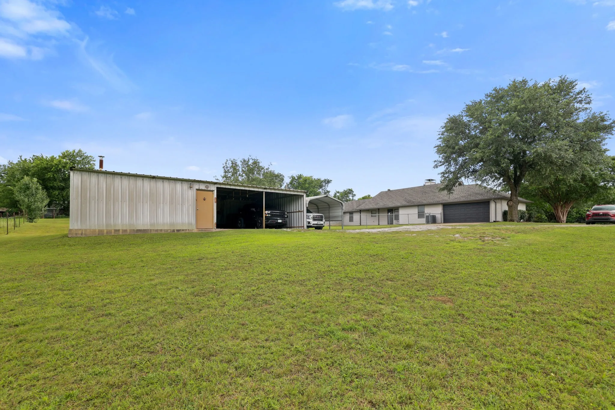 Additional storage building, lean to & 1-car carport