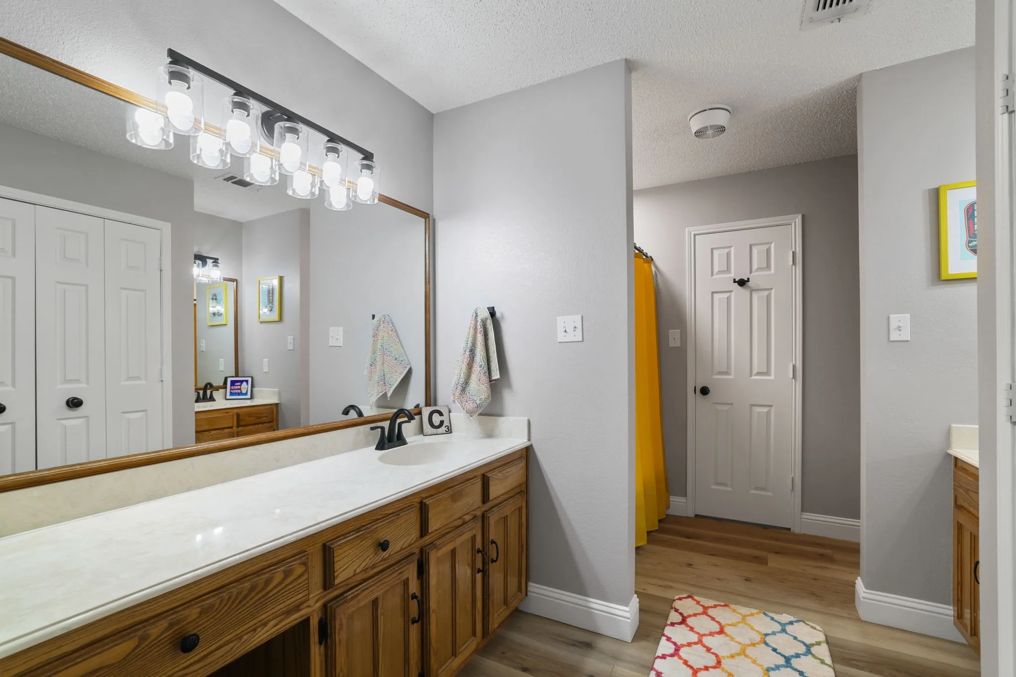Double & separate vanities in second primary suite
