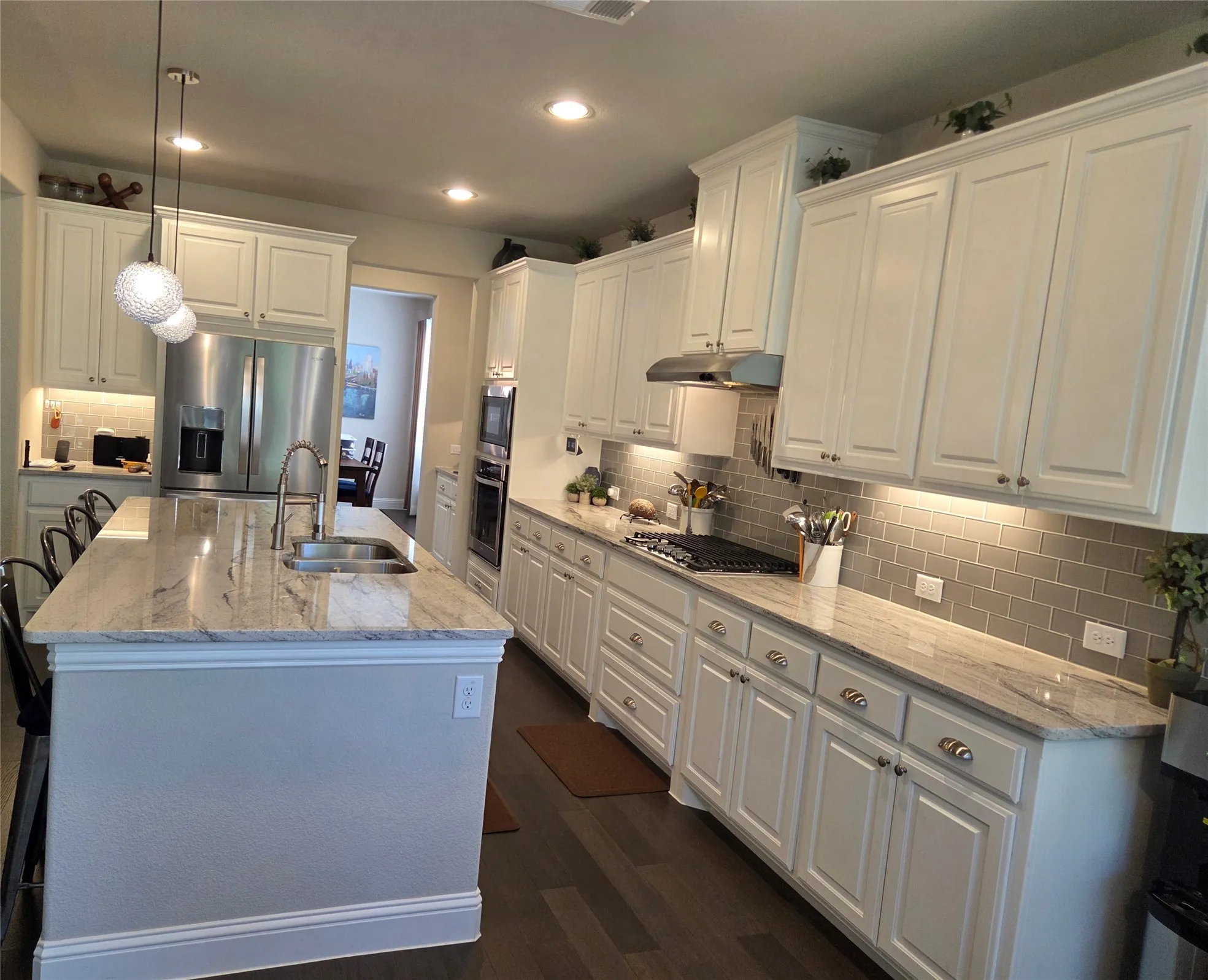 Gourmet kitchen with ample cabinets.