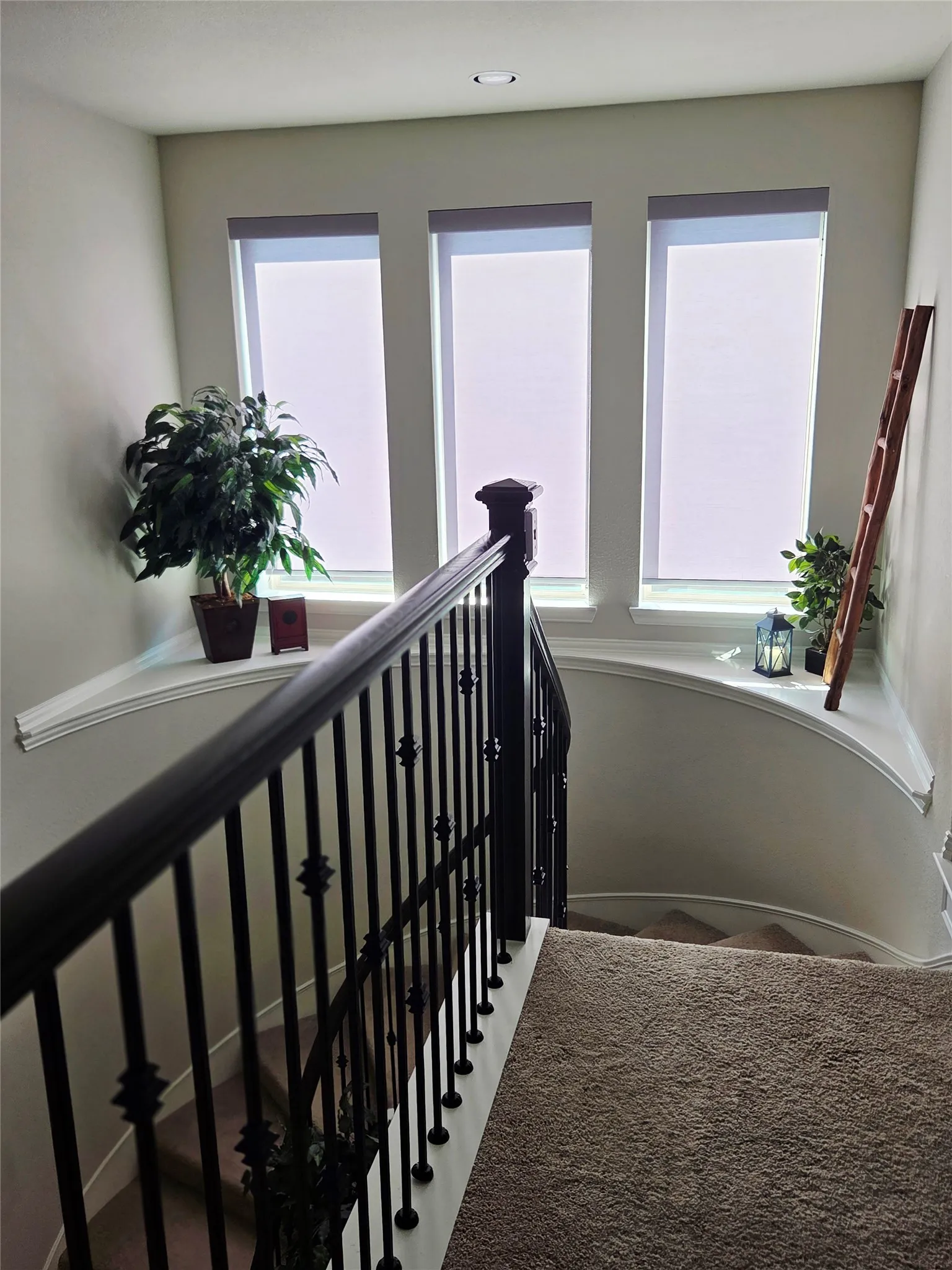 Decorative ledge along stairwell.