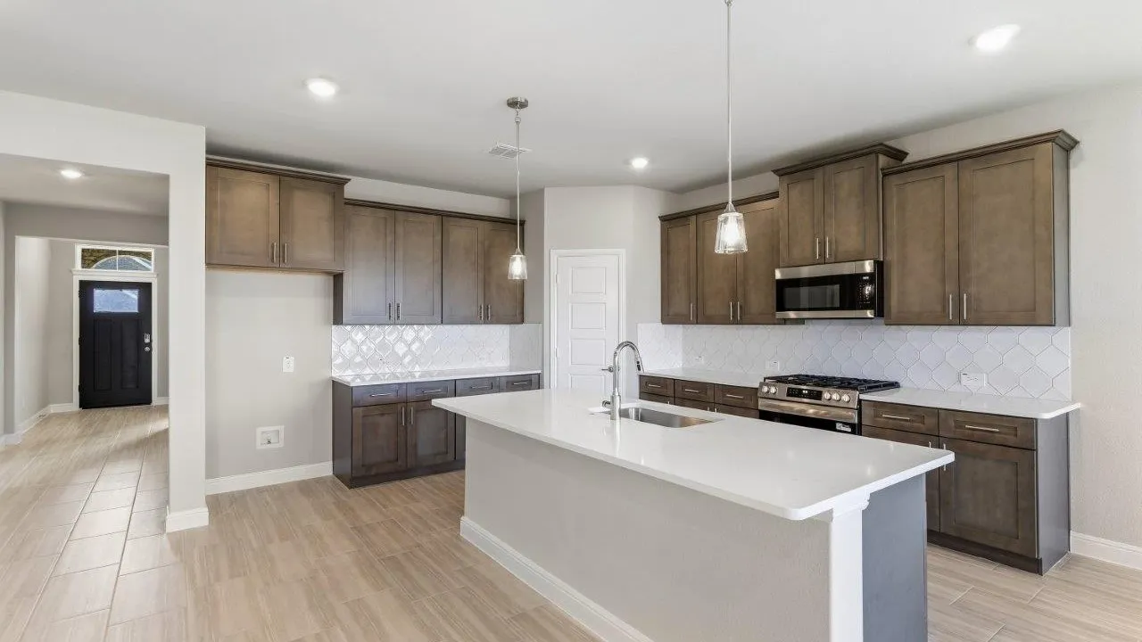 Kitchen-All Home and community information, including pricing, included features, terms, availability and amenities, are subject to change at any time without notice or obligation. All Drawings, pictures, photographs, video, square footages, floor plans, elevations, features, colors and sizes are approximate for illustration purposes only and will vary from the homes as built.