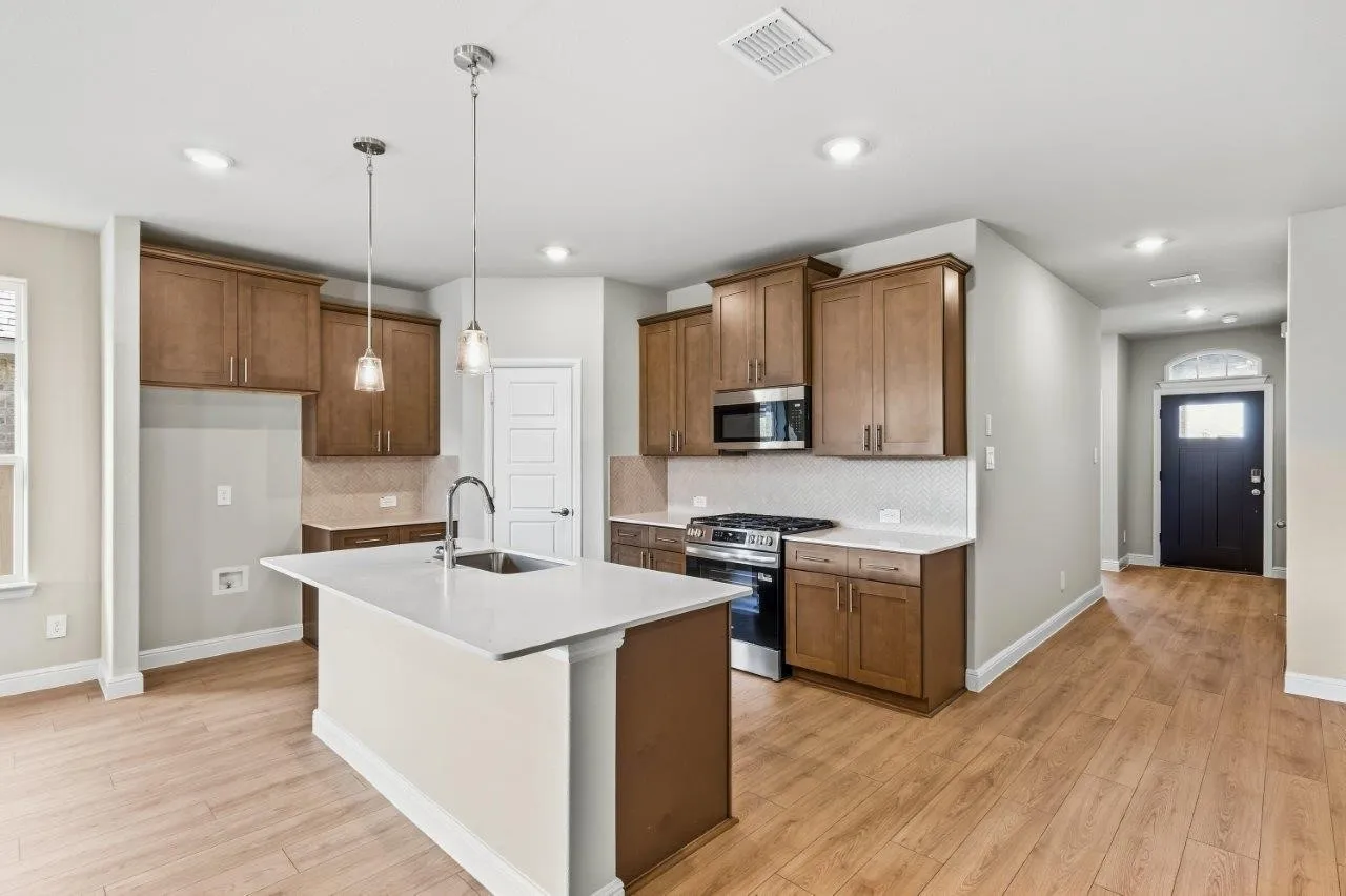 Kitchen-All Home and community information, including pricing, included features, terms, availability and amenities, are subject to change at any time without notice or obligation. All Drawings, pictures, photographs, video, square footages, floor plans, elevations, features, colors and sizes are approximate for illustration purposes only and will vary from the homes as built.