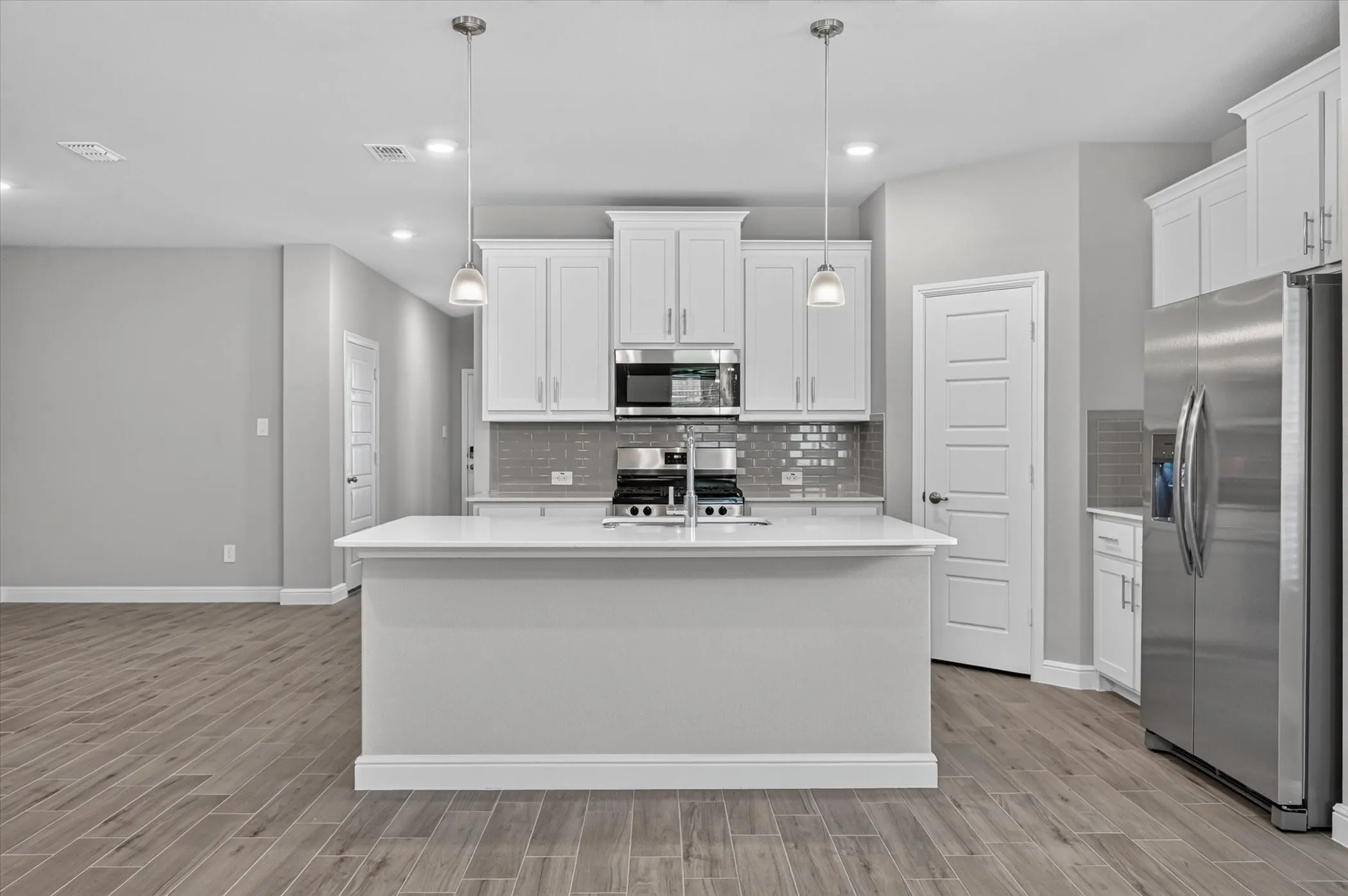 Kitchen- All Home and community information, including pricing, included features, terms, availability and amenities, are subject to change at any time without notice or obligation. All Drawings, pictures, photographs, video, square footages, floor plans, elevations, features, colors and sizes are approximate for illustration purposes only and will vary from the homes as built.
