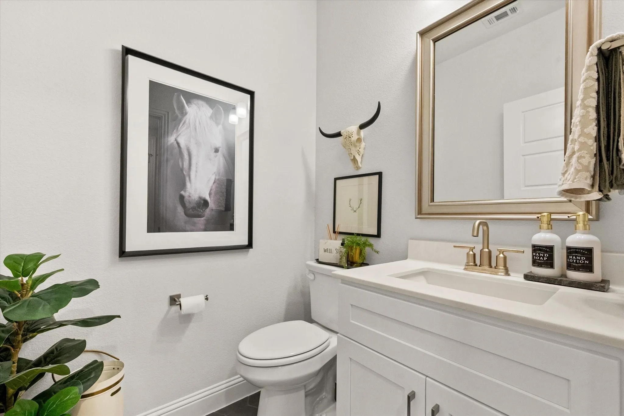 Half bath serves game and media rooms
