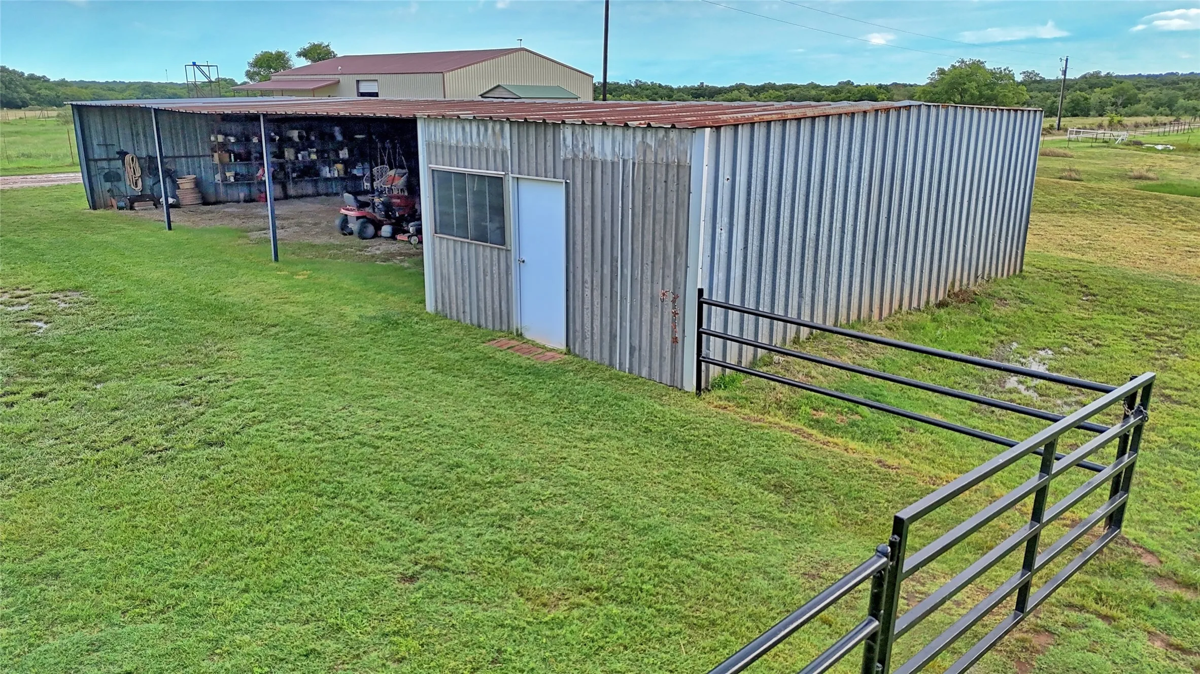 Concrete floor in enclosed area and 3 bays