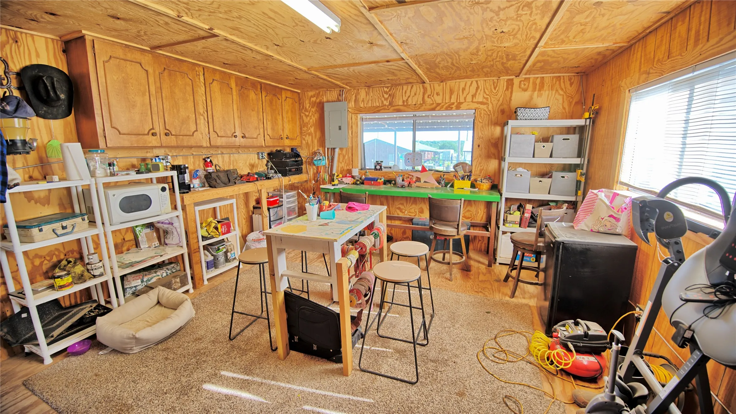Enclosed shop inside barn