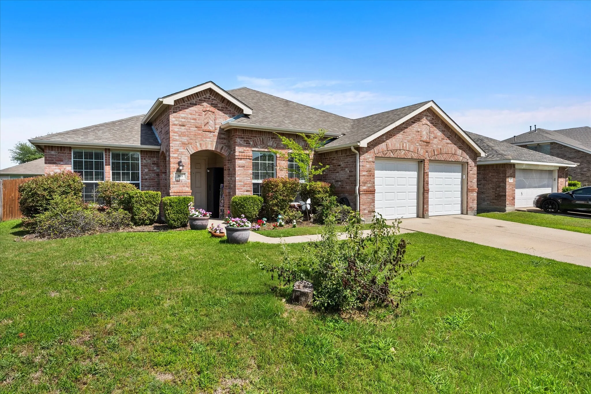 Brick facade exterior with arched entry