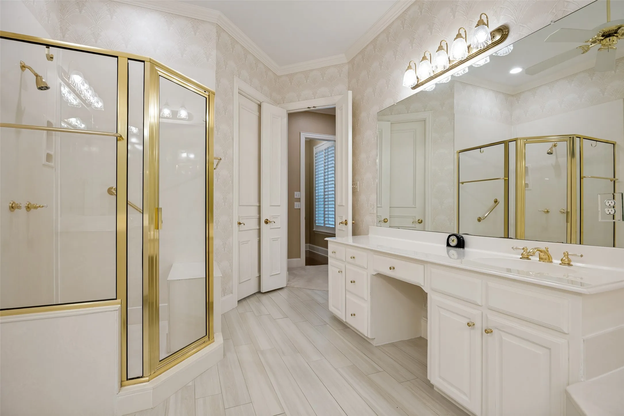 Primary Bath featuring walk in shower and private water closet