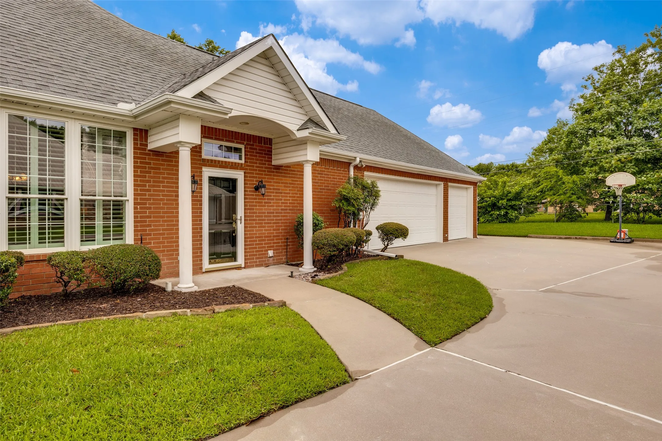 Side Entrance and 3-Car Garage