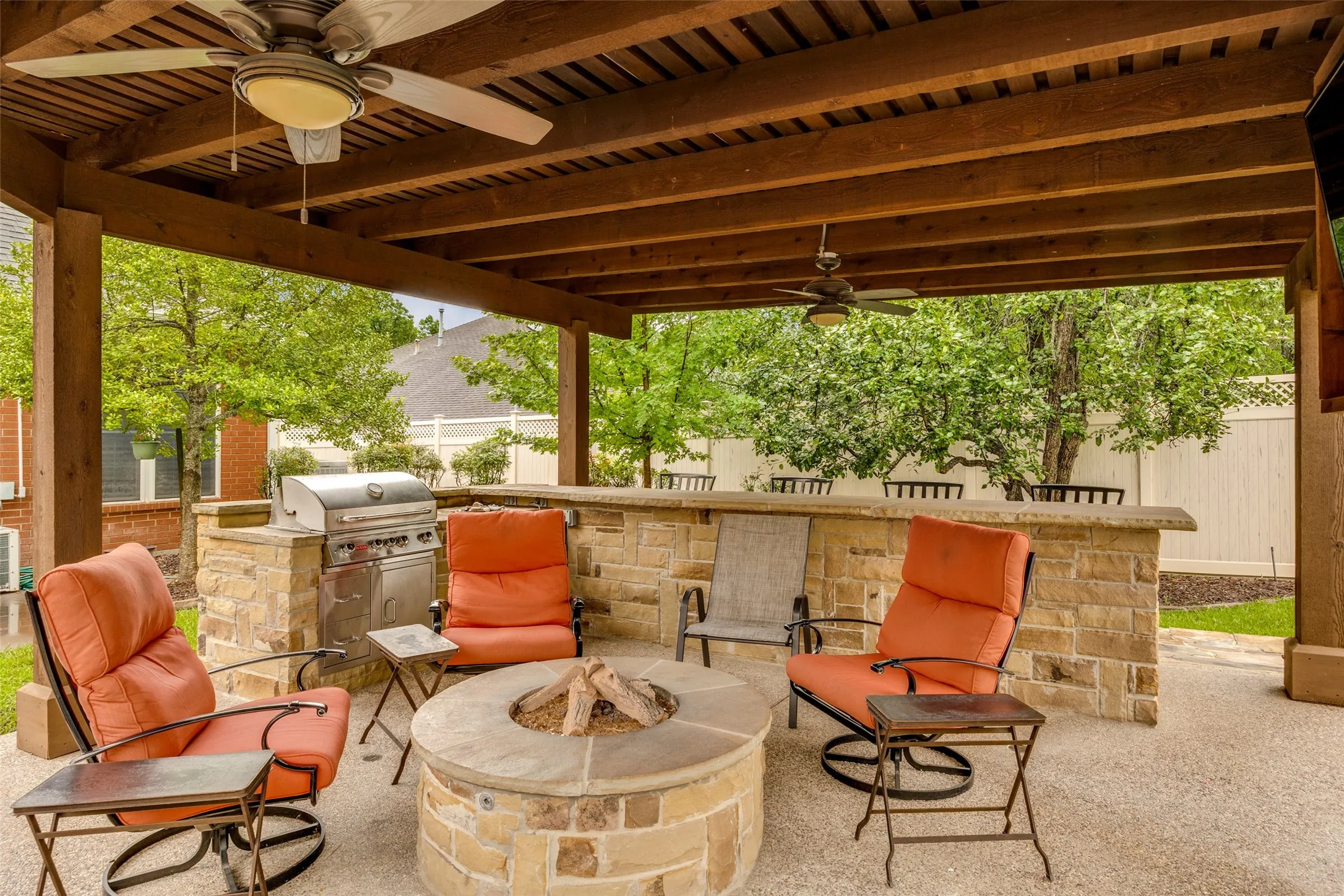 Outdoor living area featuring fire pit