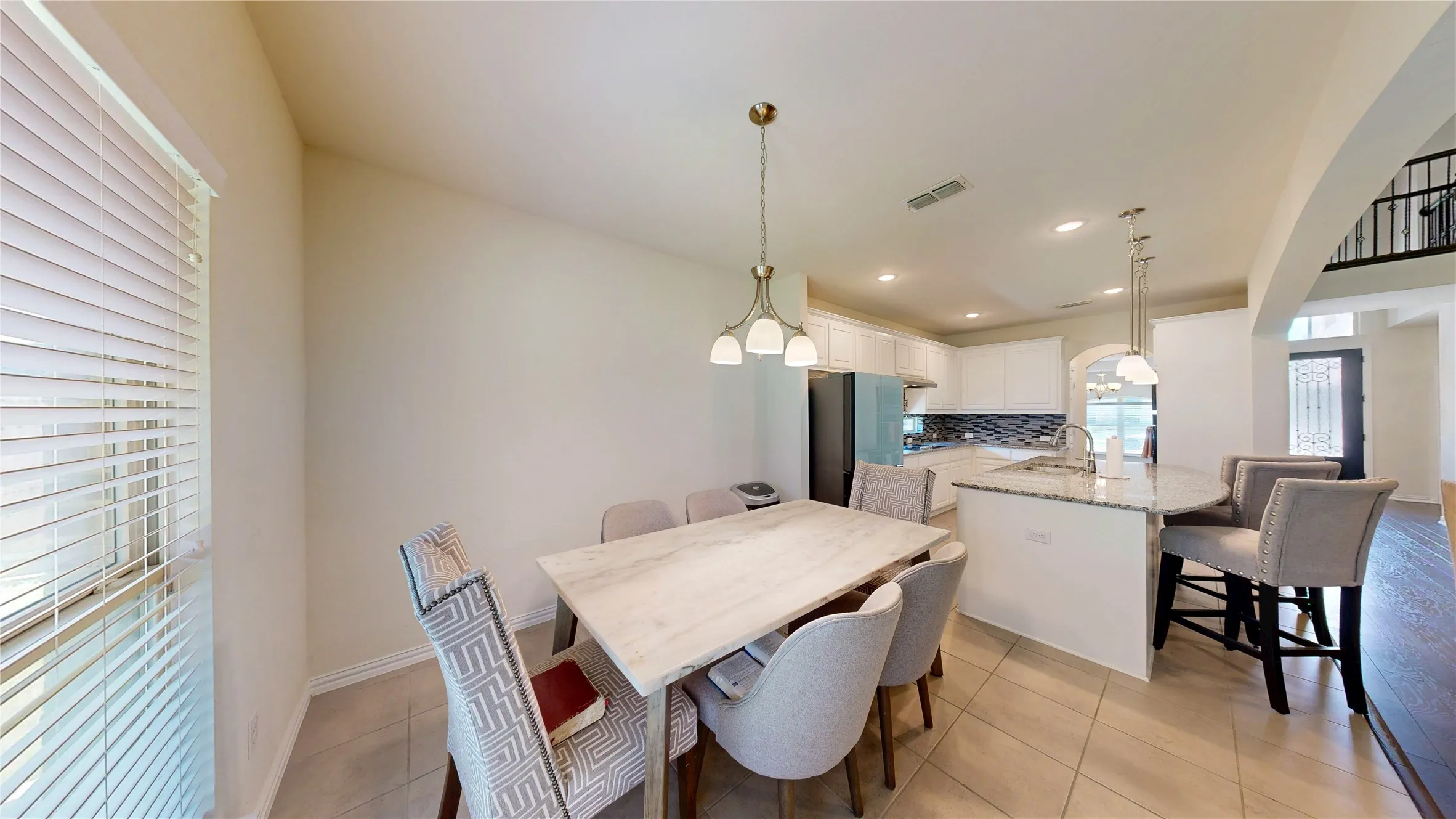 Warm neutral wall tones with plush carpet flooring