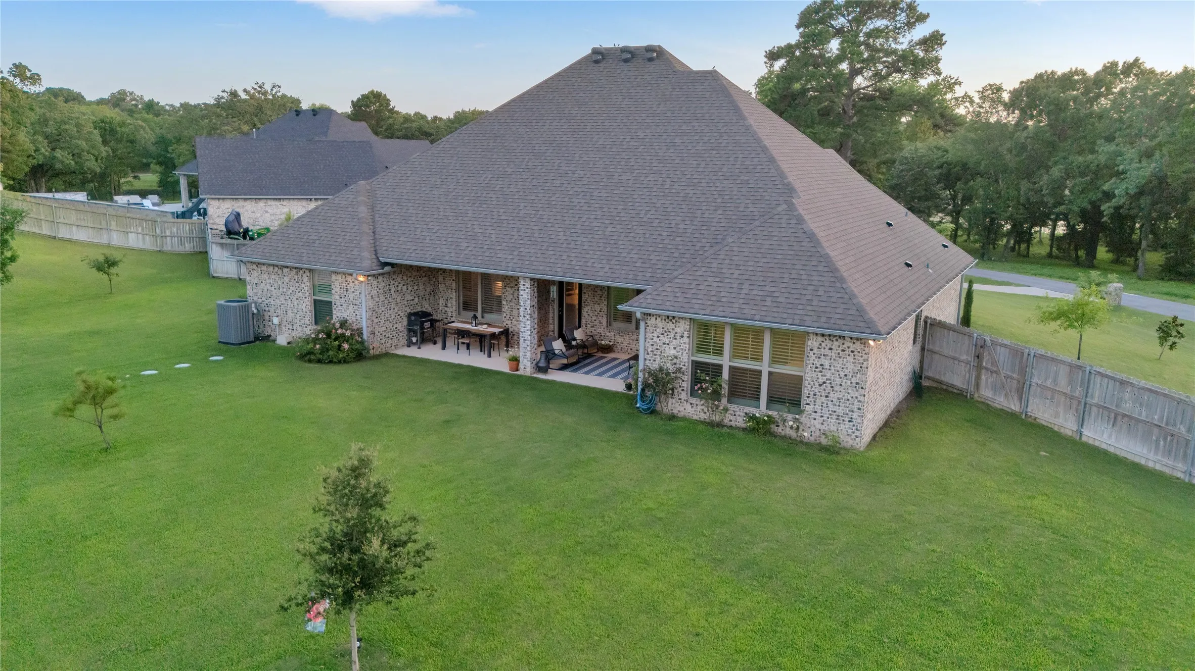 Large backyard could house a large shop and pool!