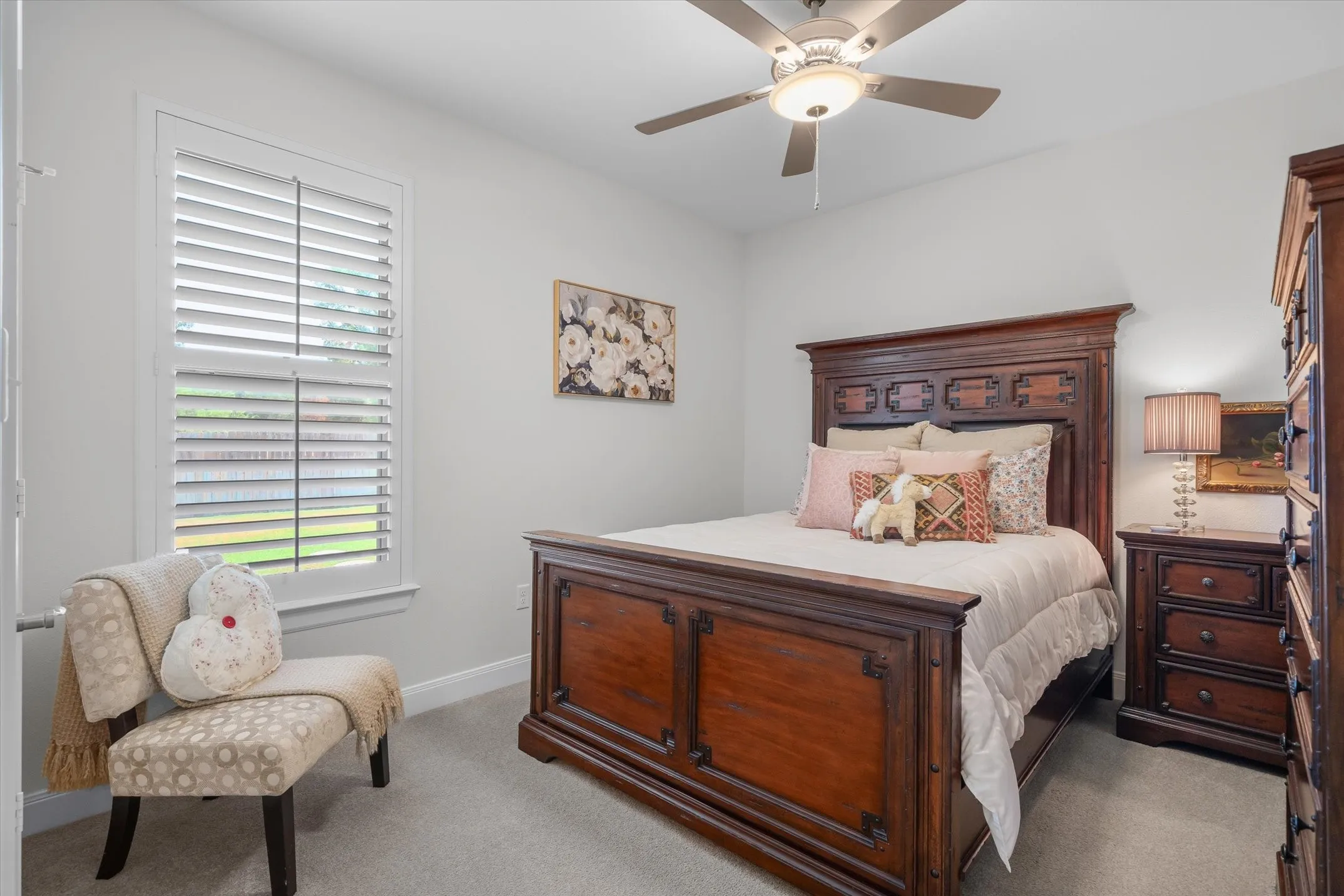 Bedroom 2 makes a nice private guest room with pretty views of the backyard